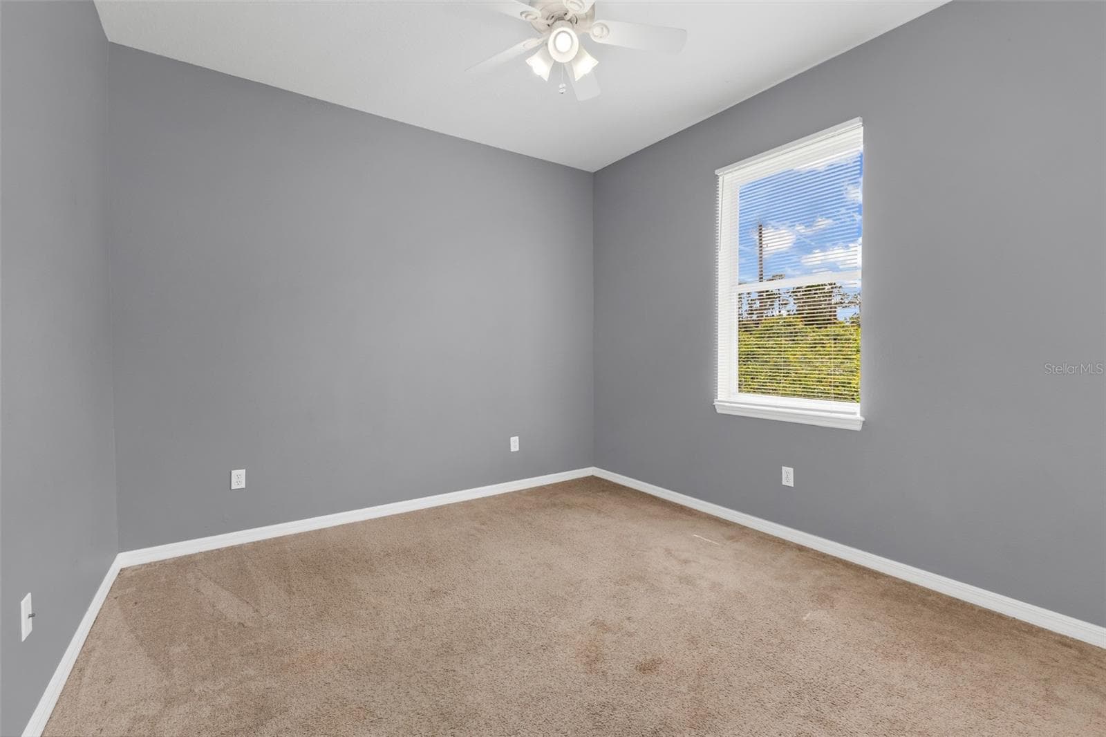 Guest bedroom 2 with carpet flooring. - 2739 ATWATER DR, NORTH PORT