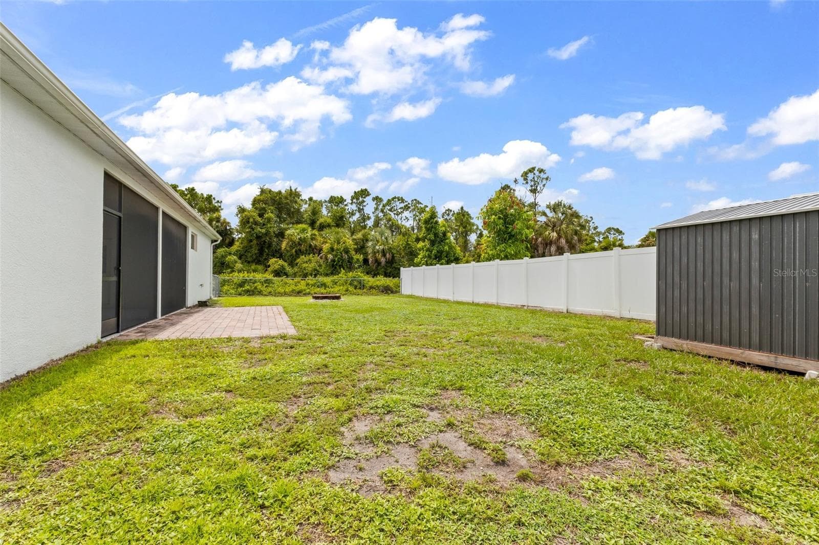 Fenced in backyard. - 2739 ATWATER DR, NORTH PORT