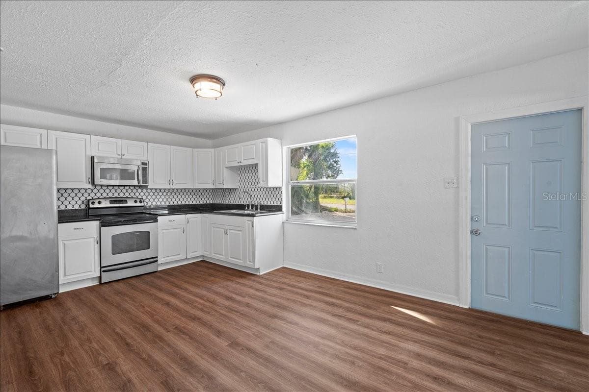 Single Family Residence at 704 E WILMA ST, TAMPA, photo 7 of 29