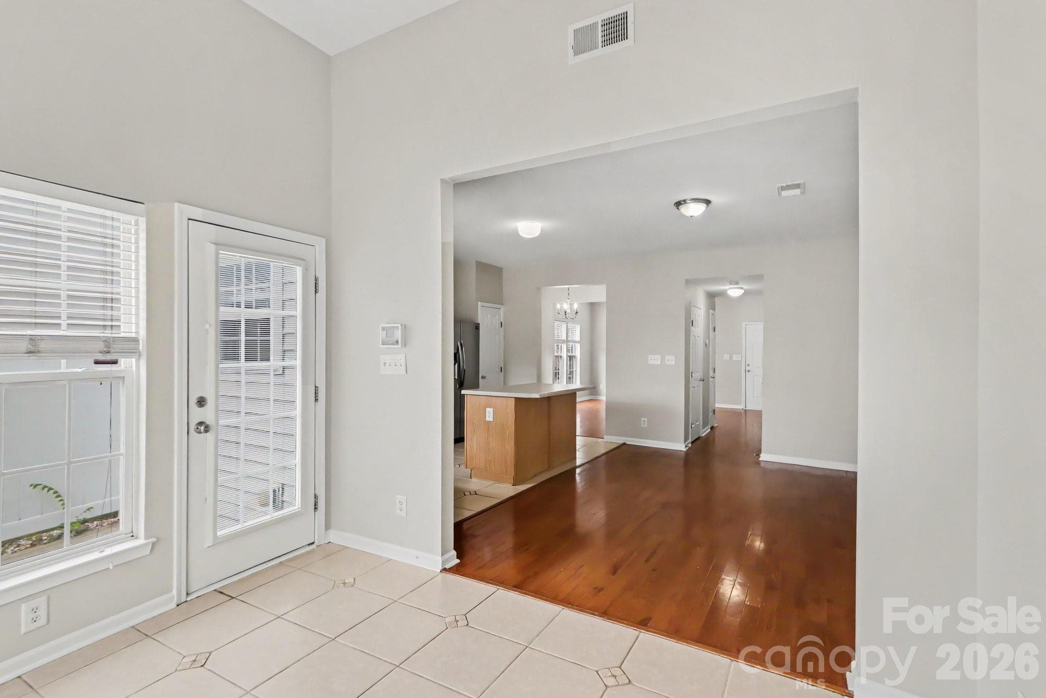 Sunroom off dining and kitchen area - 4960 Sunburst Lane, Charlotte