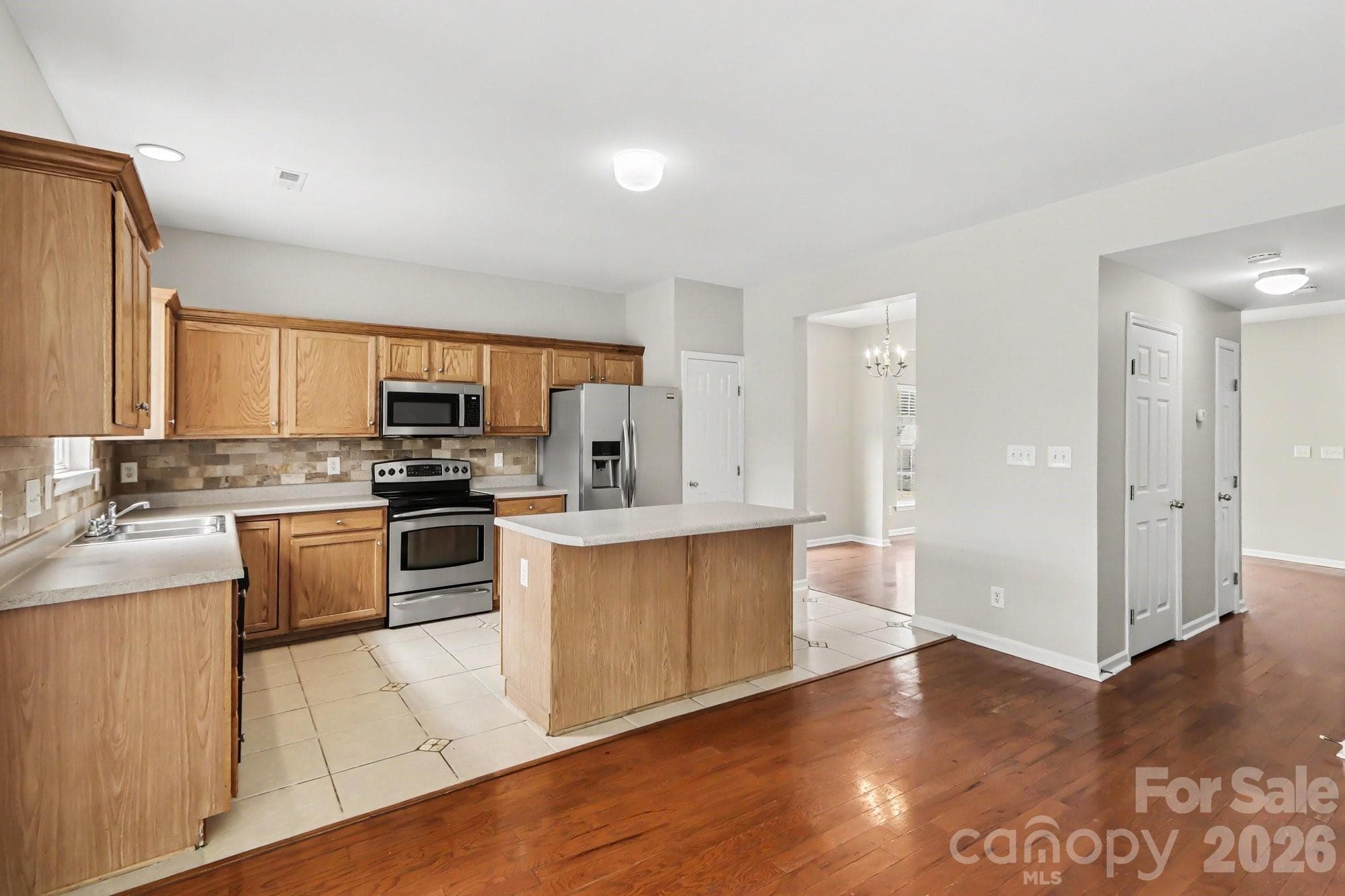 Side angle of kitchen from the dining area - 4960 Sunburst Lane, Charlotte