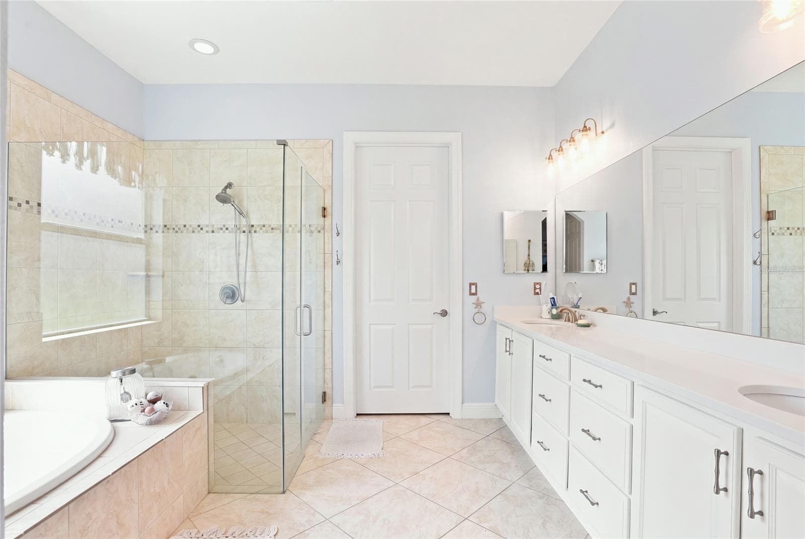 primary bath , shower , garden tub, walk in closet - 5057 LAKE OVERLOOK AVE, BRADENTON