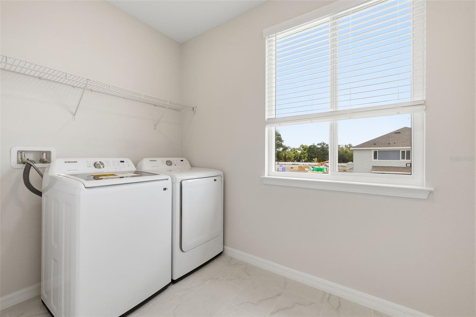 Laundry room - model home - 5839 ANGELA LEYLA PL, RIVERVIEW