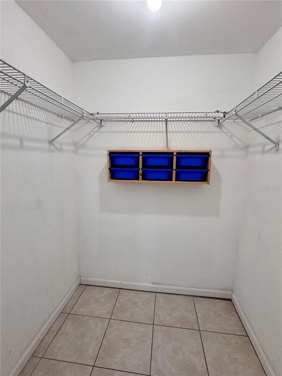 Primary Bedroom walk in closet - 1709 EATON DR NE, CLEARWATER