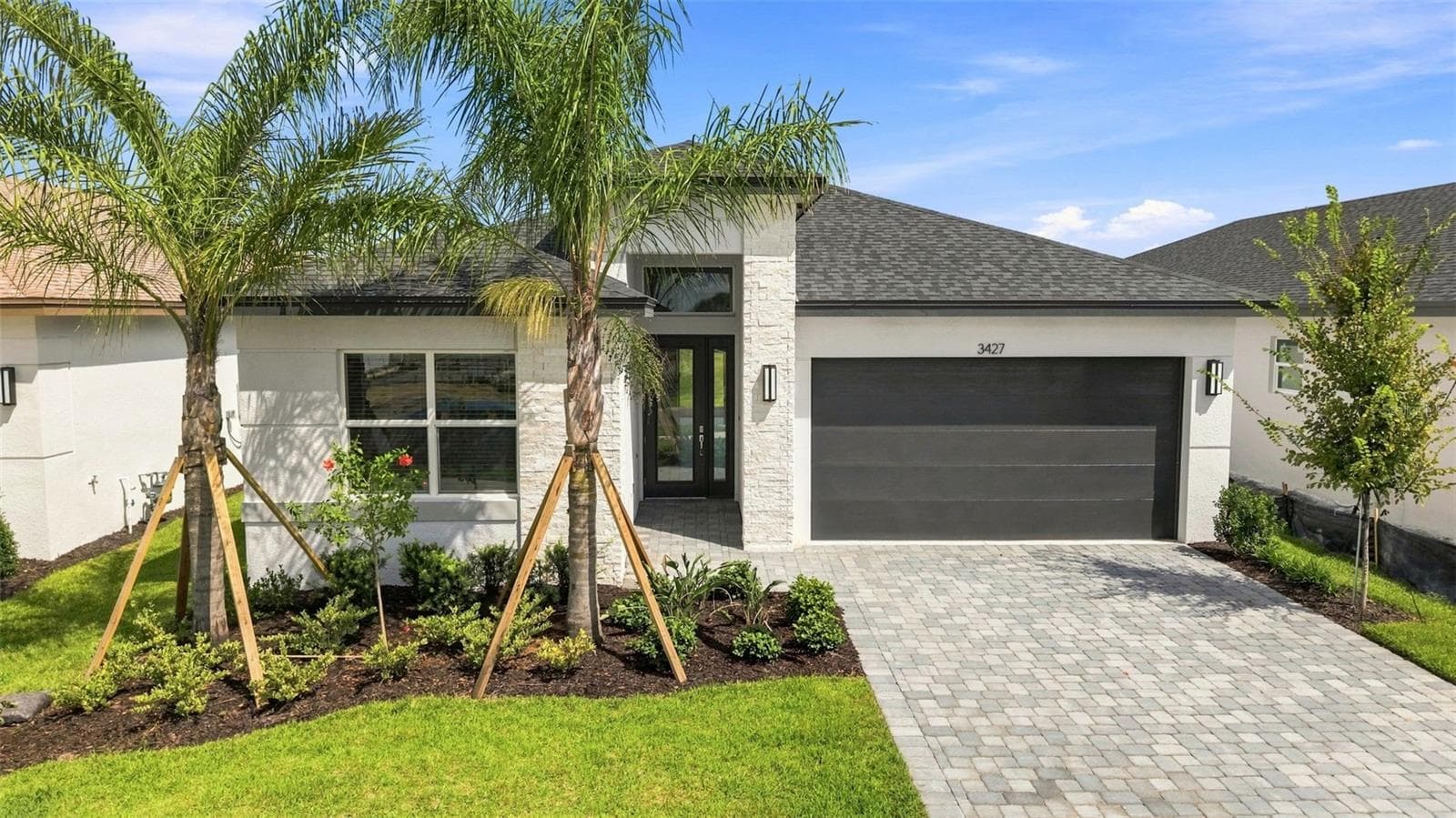 Landscaping, Coach Lights and Beautiful Stone Aesthetics - 3427 MALTA AVE, WESLEY CHAPEL