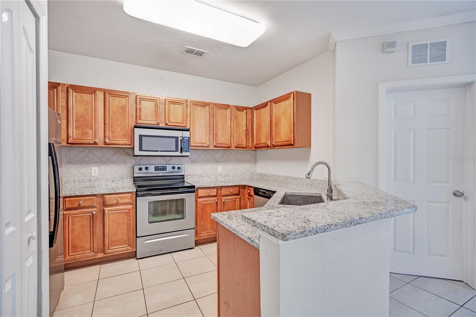 Townhouse at 6119 METROWEST BLVD #103, ORLANDO, photo 7 of 38