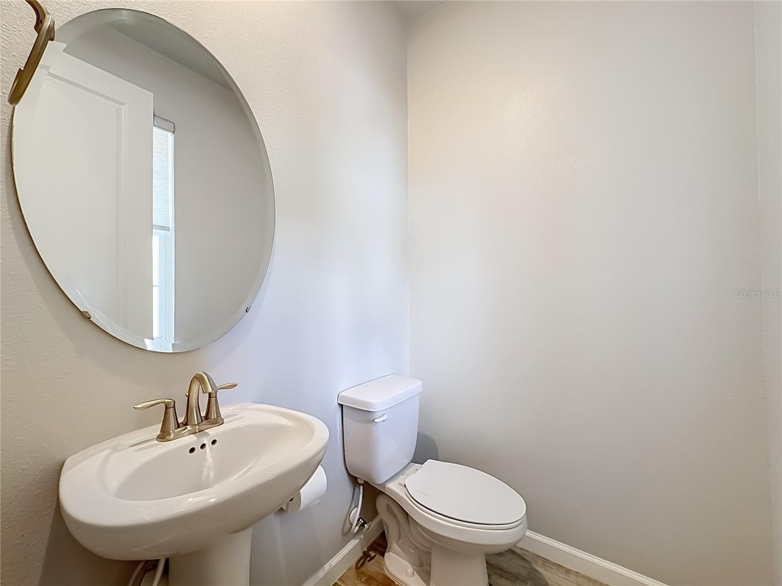 First Floor half bath - 5517 COACHWOOD CV, BRADENTON