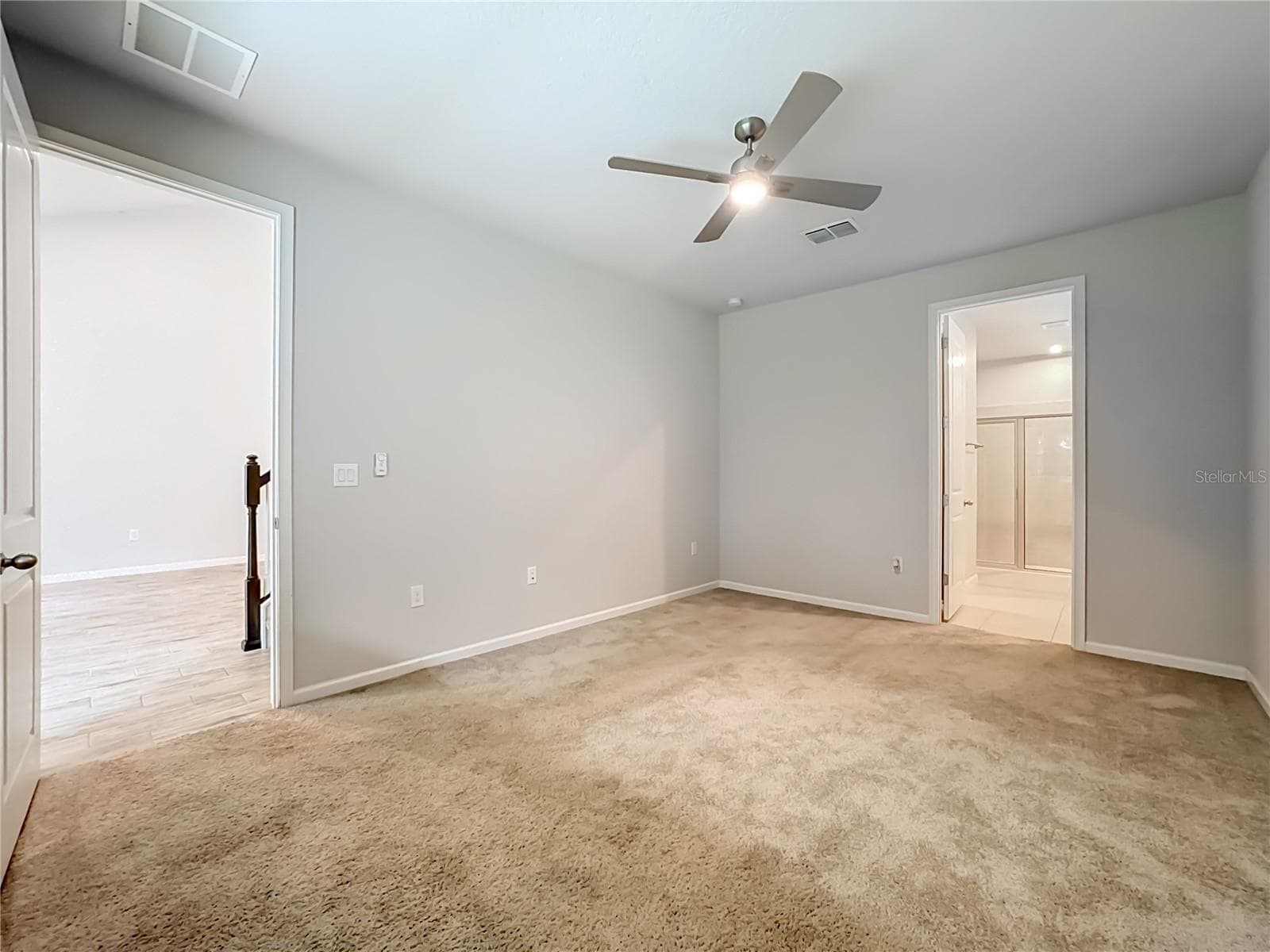 First Floor Primary Bedroom - 5517 COACHWOOD CV, BRADENTON