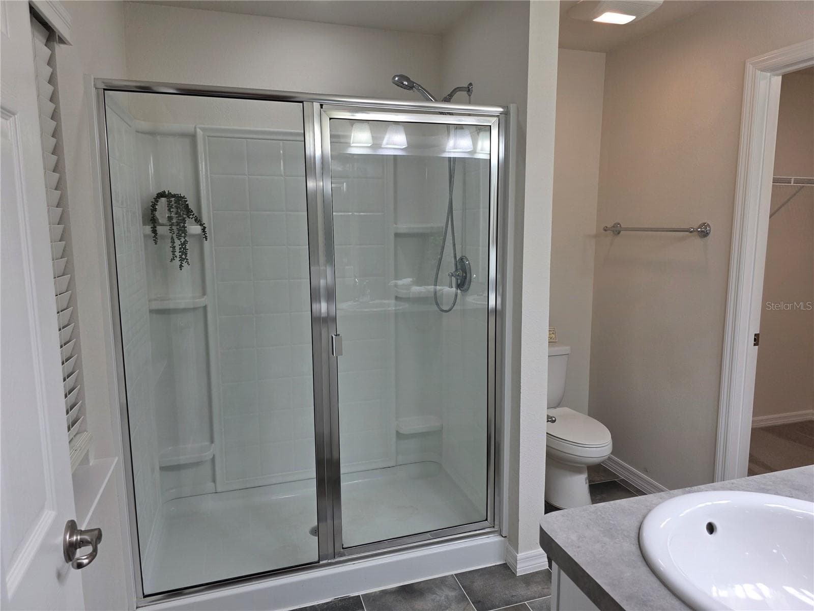 The shower in the primary bathroom - 3418 SW 155TH PL, OCALA