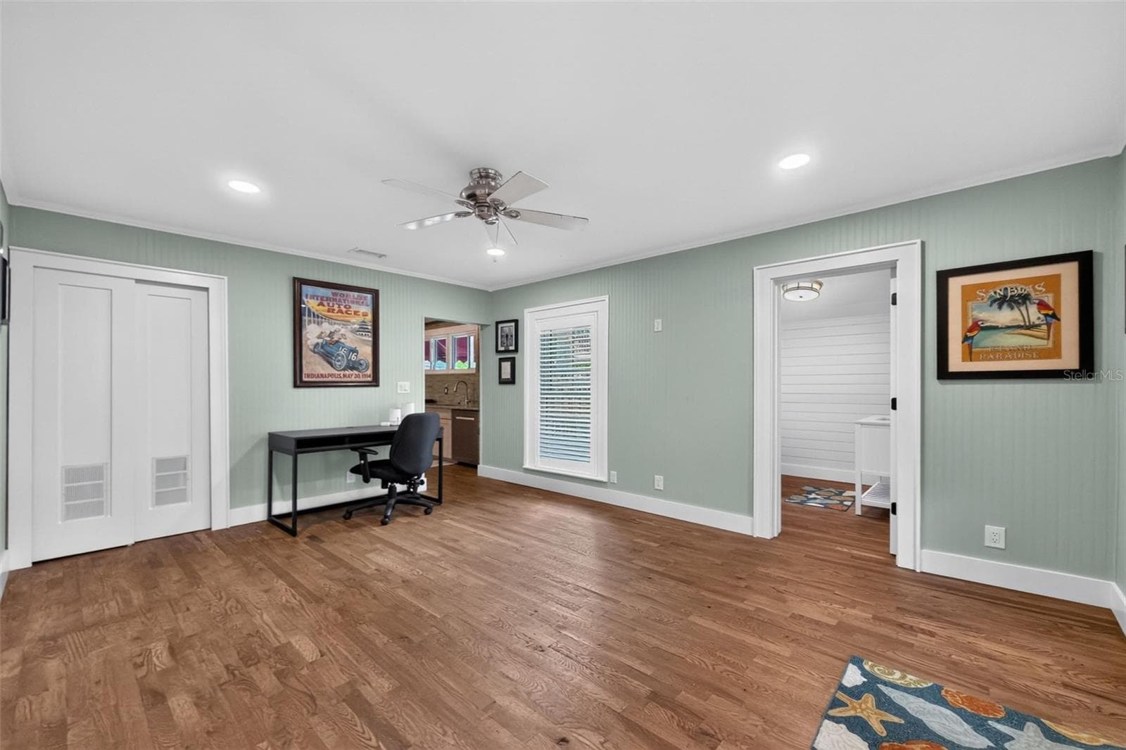 Rear family room view of 1/2 bath doorway - 502 W MARION AVE, PUNTA GORDA