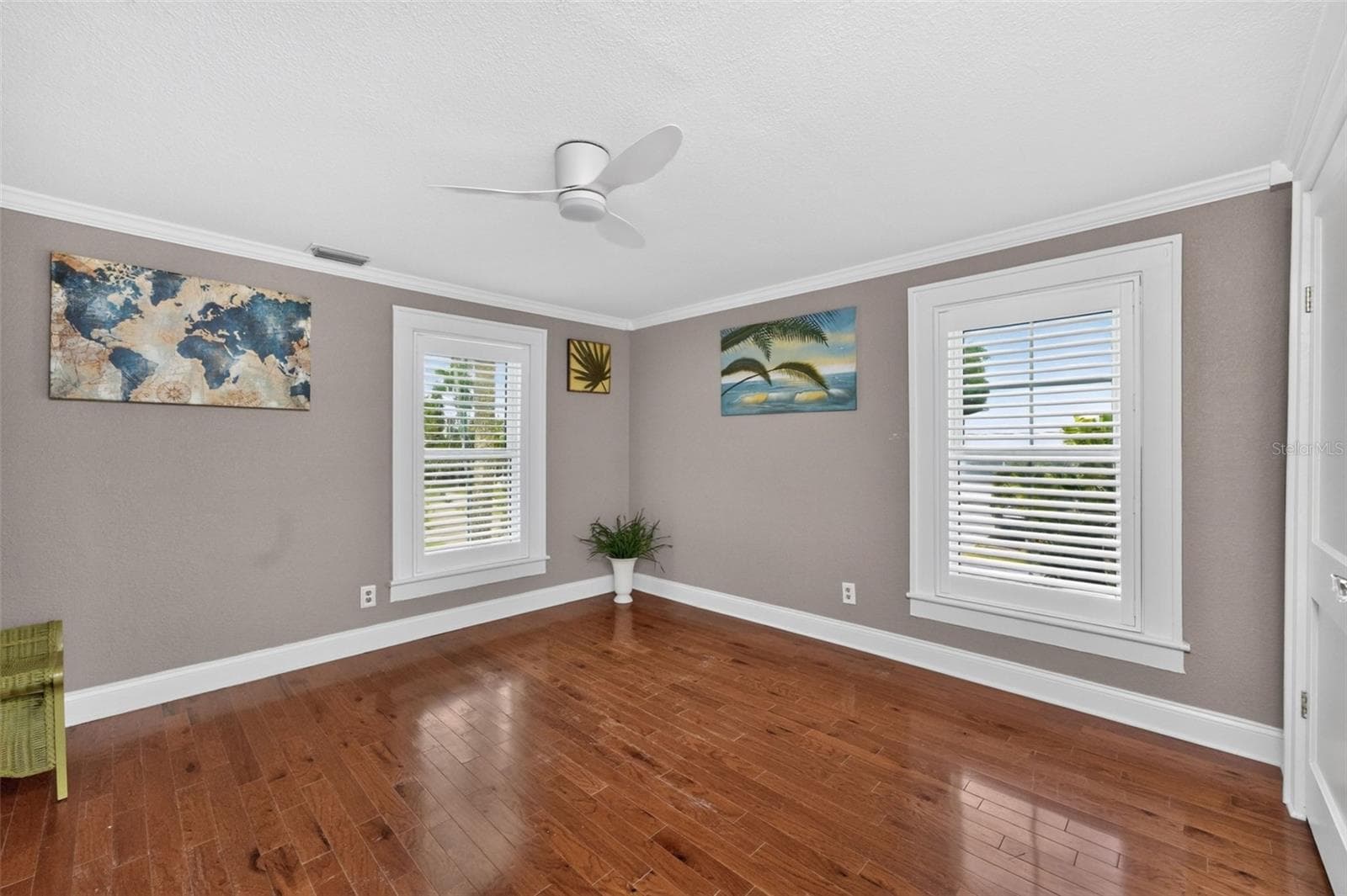 Primary Bedroom #1 with Harbor and Court yard view - 502 W MARION AVE, PUNTA GORDA