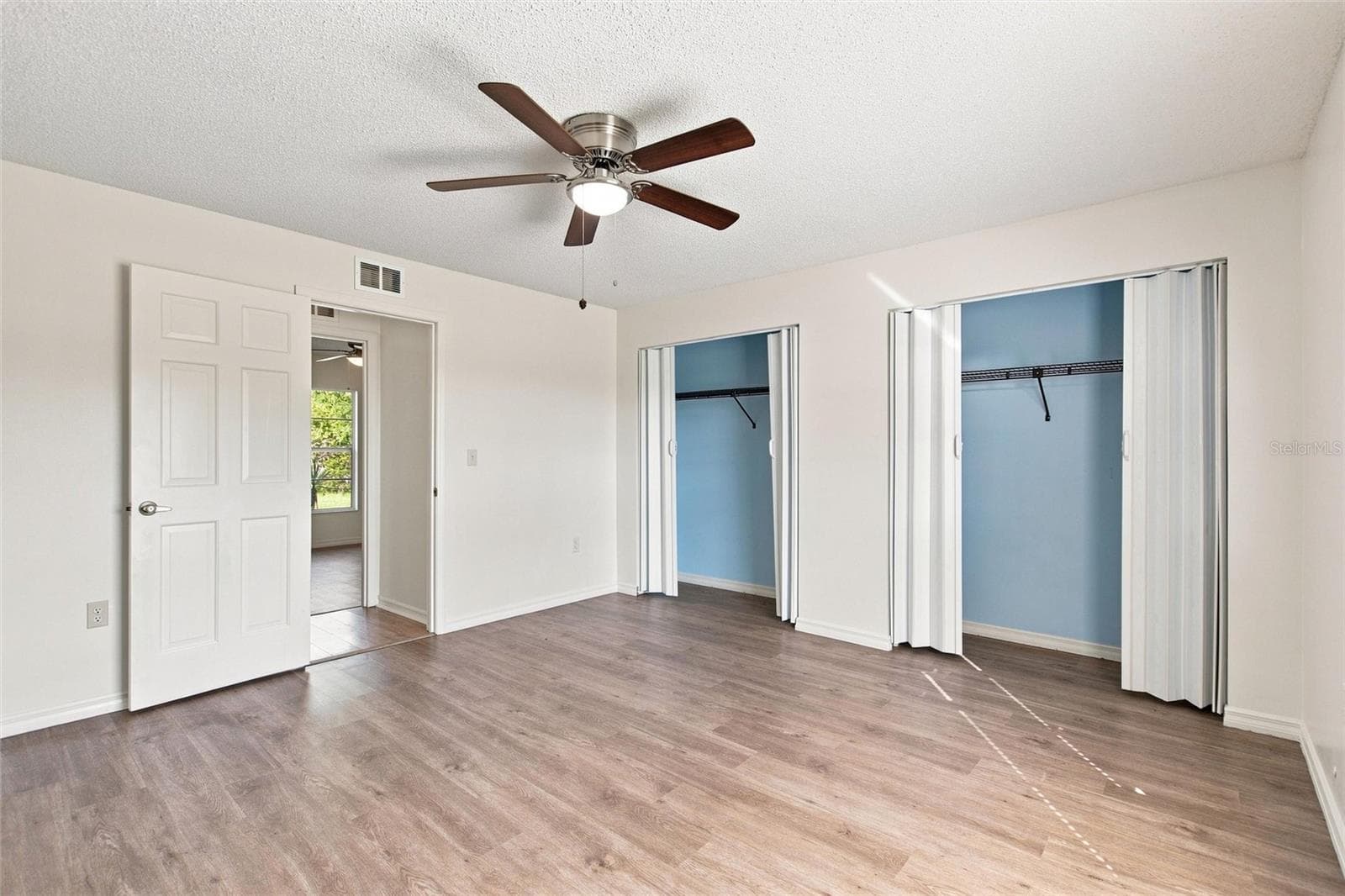 BEDROOM 2 WITH NEW LUXURY VINYL FLOORING - 2501 PLUMOSA DR, LAKE WALES