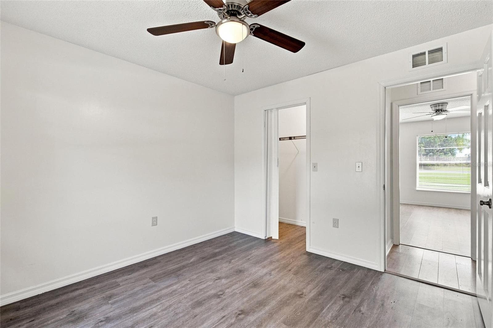 BEDROOM 3 WITH NEW LUXURY VINYL FLOORING - 2501 PLUMOSA DR, LAKE WALES