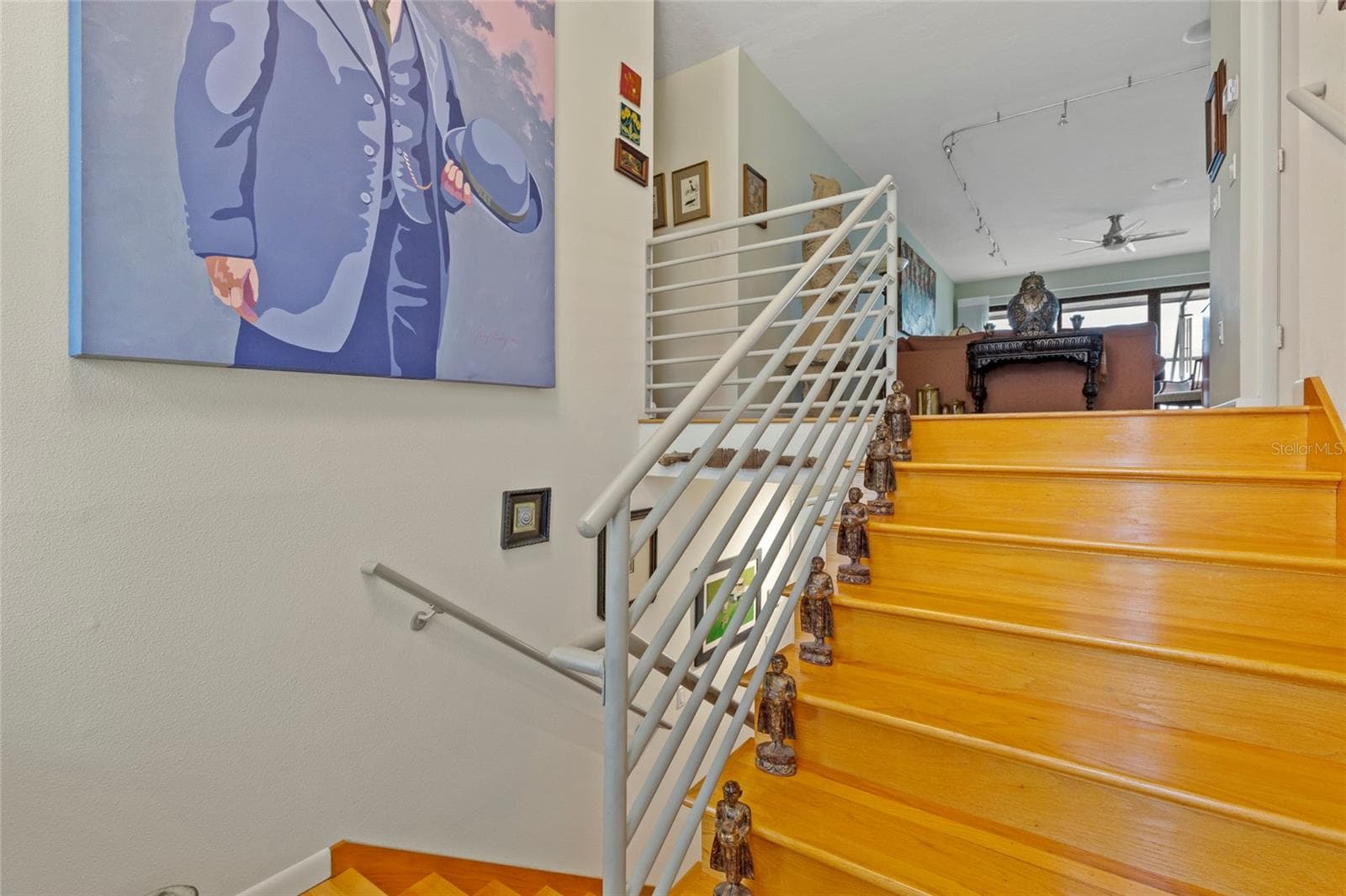 This is the foyer with stairs going to up main house (kitchen, living, dining,  bedrooms and porches - 609 42ND STREET CT W, PALMETTO