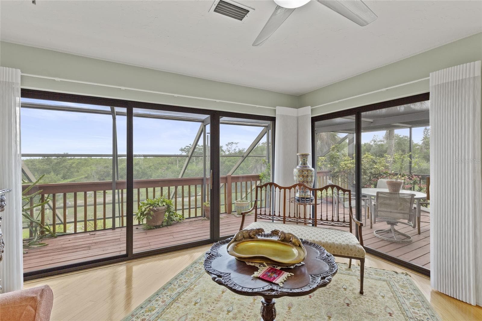 Living room and porches with views over the water - 609 42ND STREET CT W, PALMETTO