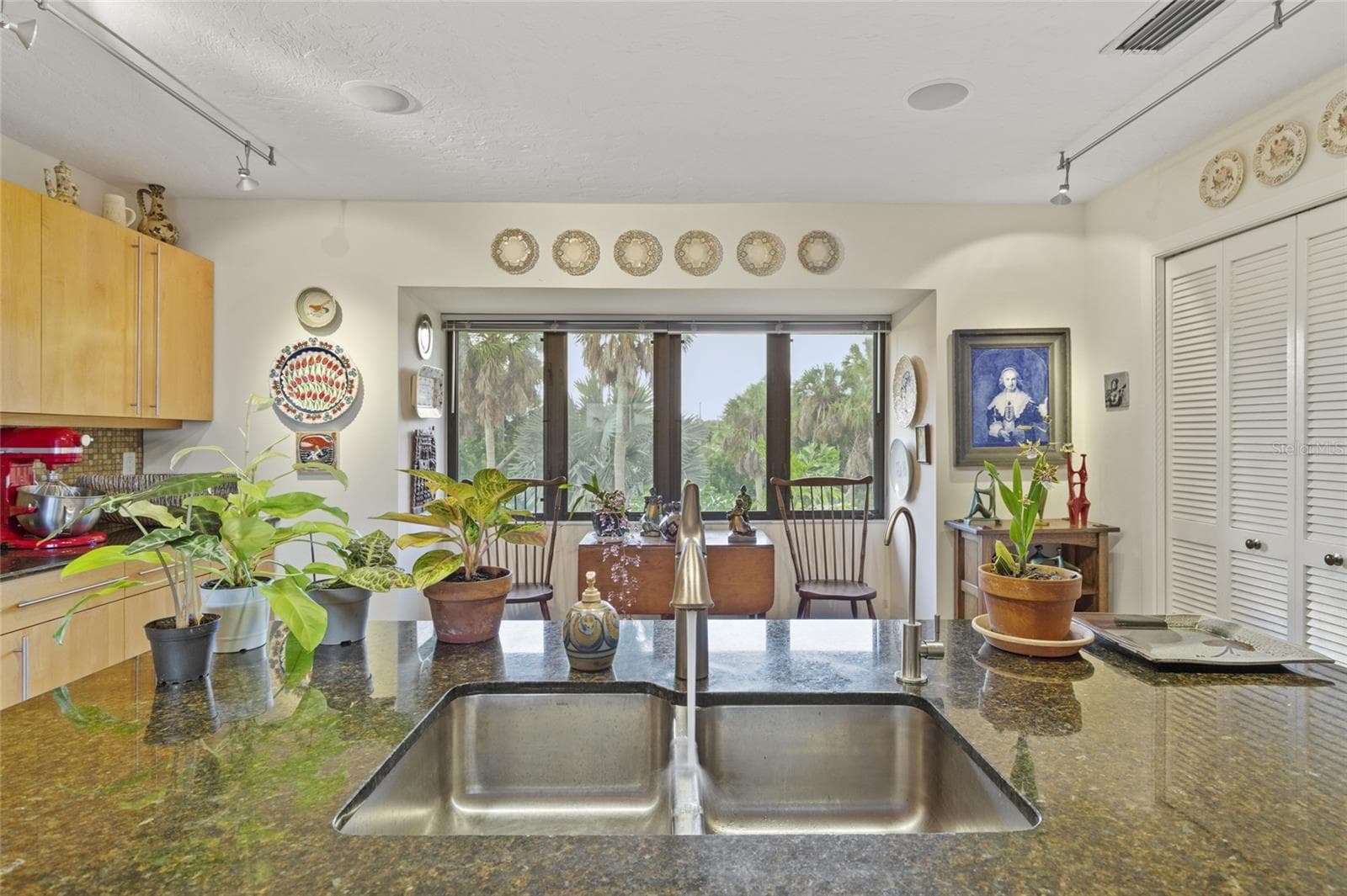 kitchen looking towards front o home,  Large pantry - 609 42ND STREET CT W, PALMETTO