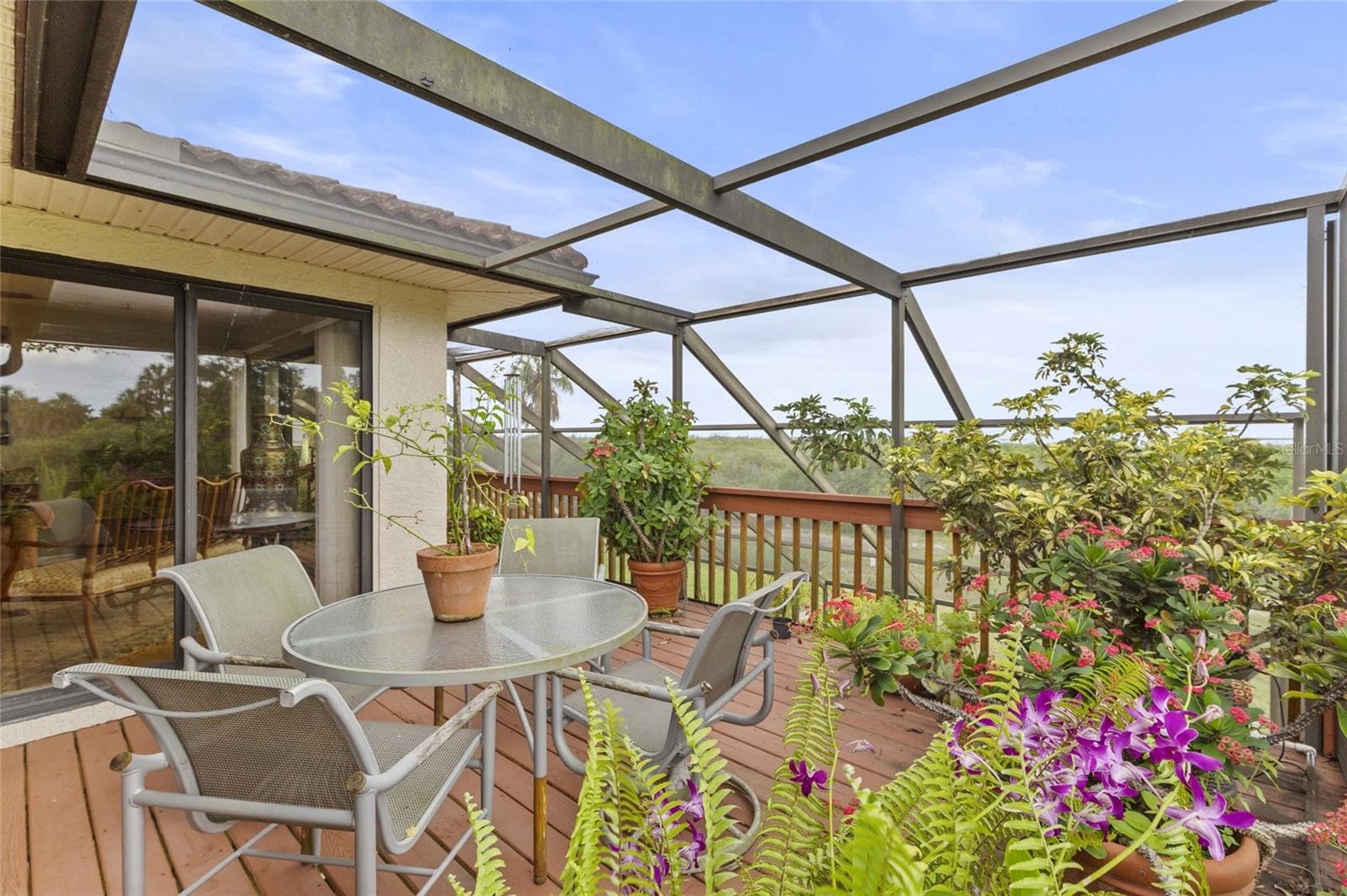 Access to porch from dining room and from living room with spectacular views over the bay - 609 42ND STREET CT W, PALMETTO