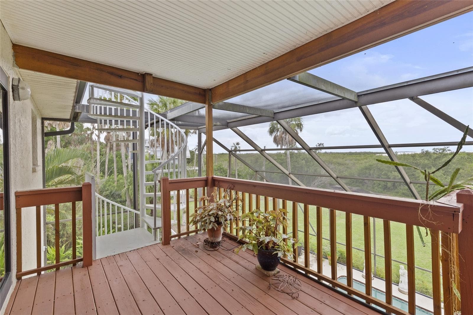 porch off primary bedroom with spiral to widows peak - 609 42ND STREET CT W, PALMETTO