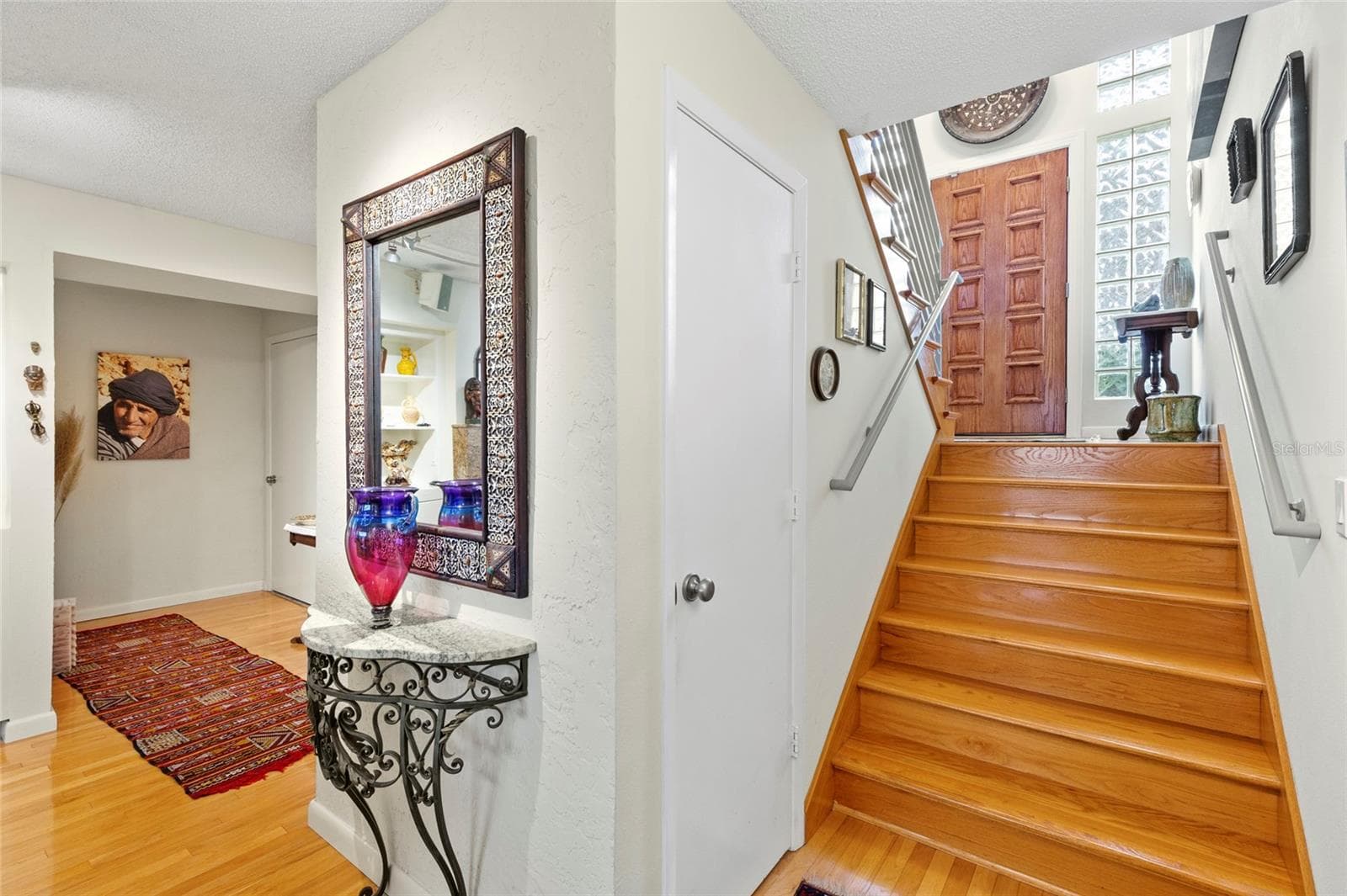 Front stairs going down to a complete suite on first floor - 609 42ND STREET CT W, PALMETTO