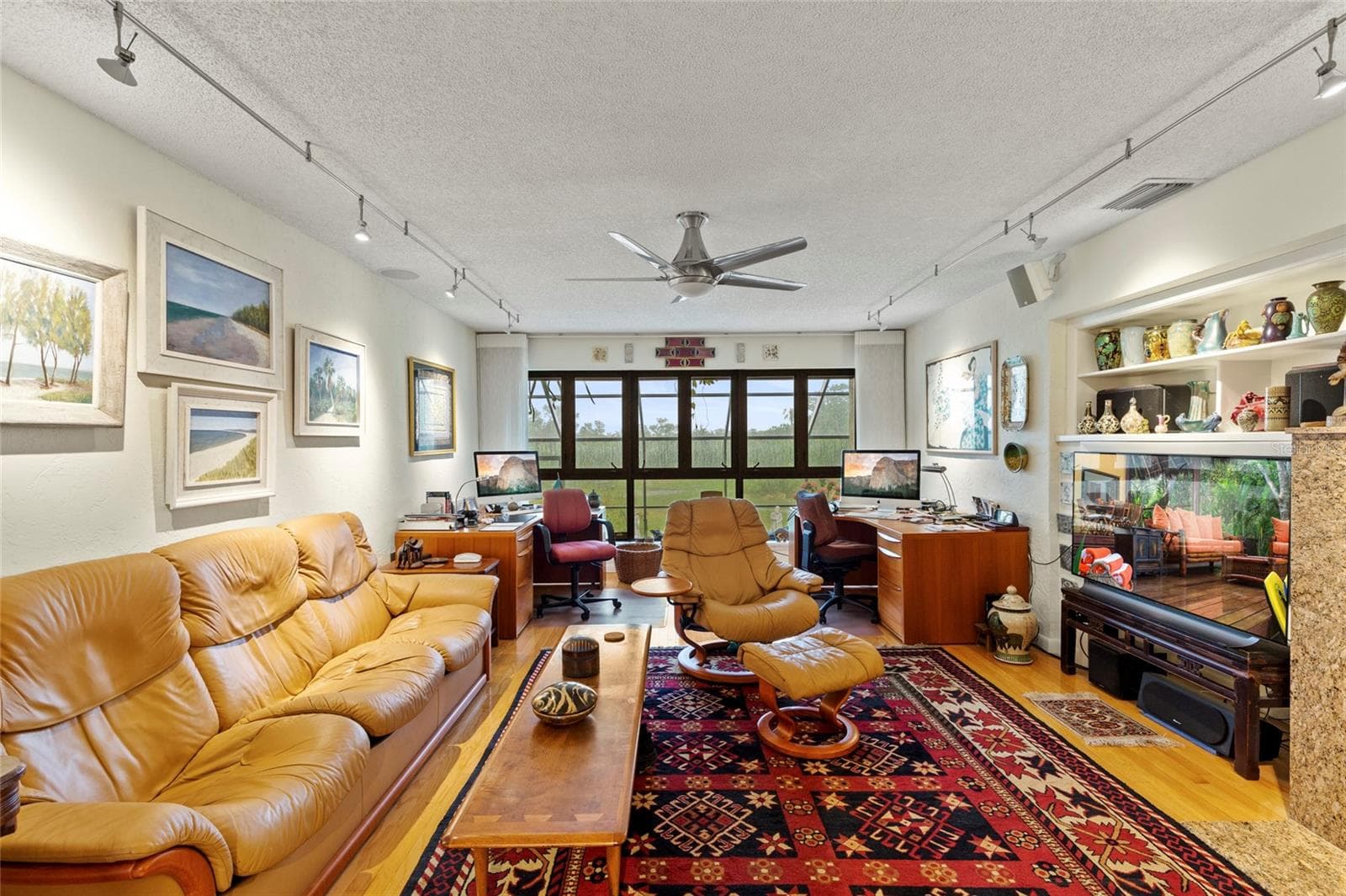 First floor living room (have two desk at back on water side) - 609 42ND STREET CT W, PALMETTO