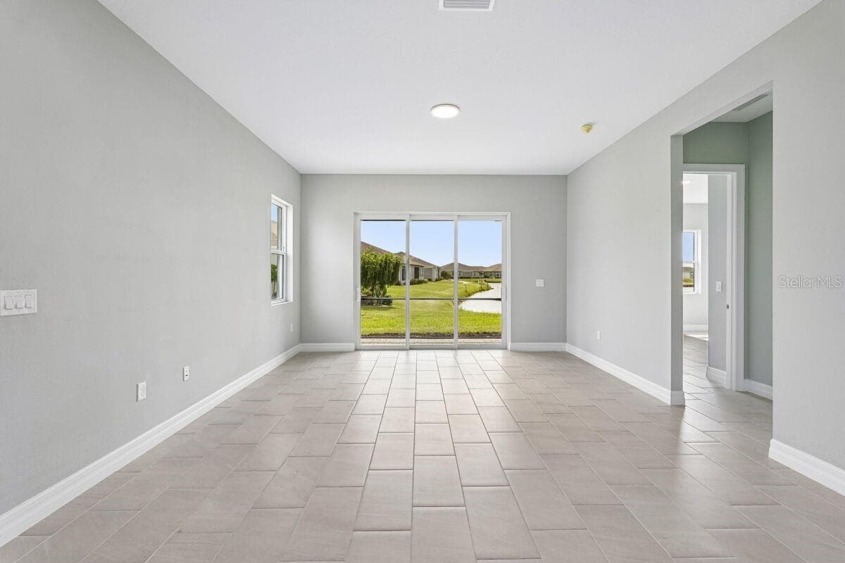 Great Room-Photo description represents the model home of same floor plan. - 1847 NOTTINGHAM TRL, PORT CHARLOTTE