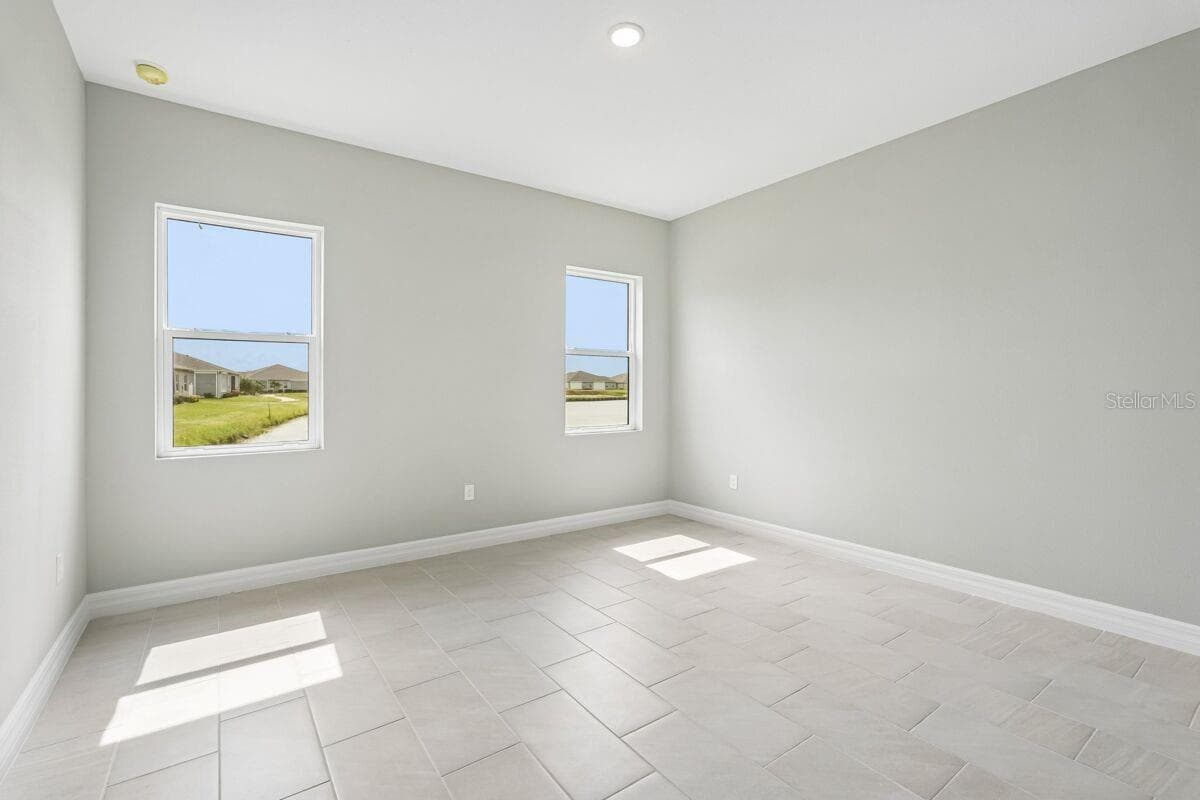 Owners Bedroom-Photo description represents the model home of same floor plan. - 1847 NOTTINGHAM TRL, PORT CHARLOTTE