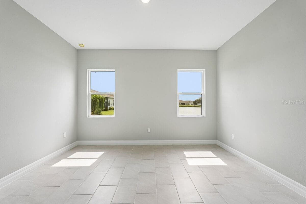 Owners Bedroom-Photo description represents the model home of same floor plan. - 1847 NOTTINGHAM TRL, PORT CHARLOTTE