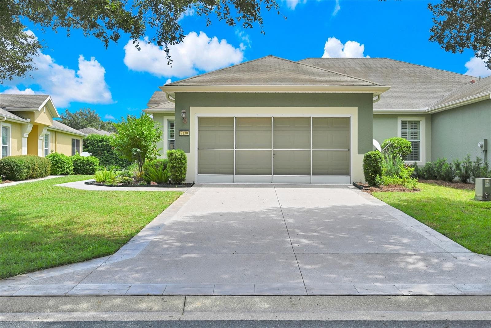 Epoxied Driveway, Walkway & Insulated Garage Door with Screen - 7139 SW 91ST CT, OCALA