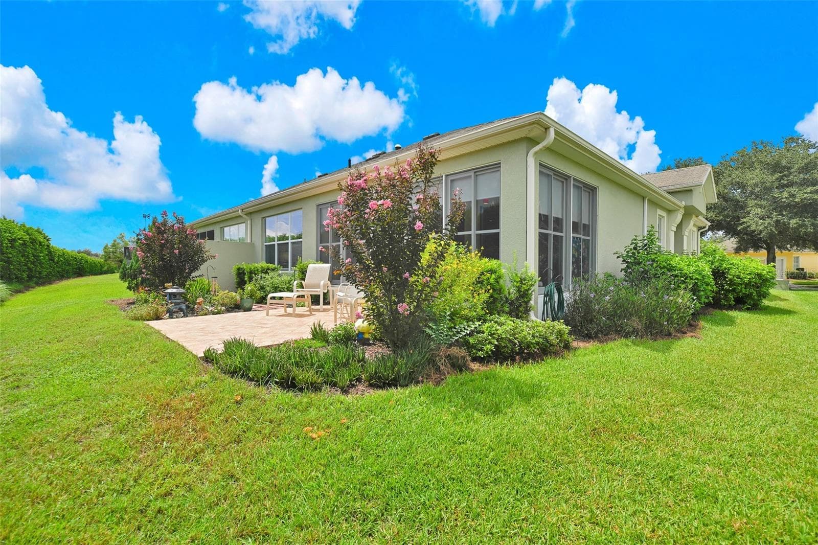 Rear private outdoor paver patio & garden area - 7139 SW 91ST CT, OCALA