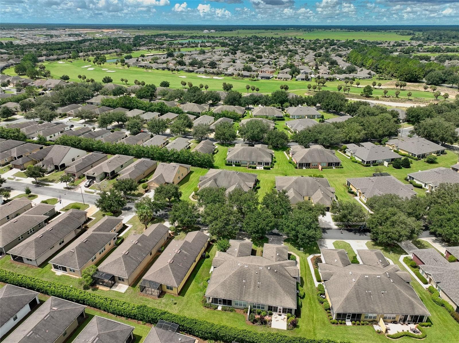 Aerial overview of neighborhood from rear of villa - 7139 SW 91ST CT, OCALA