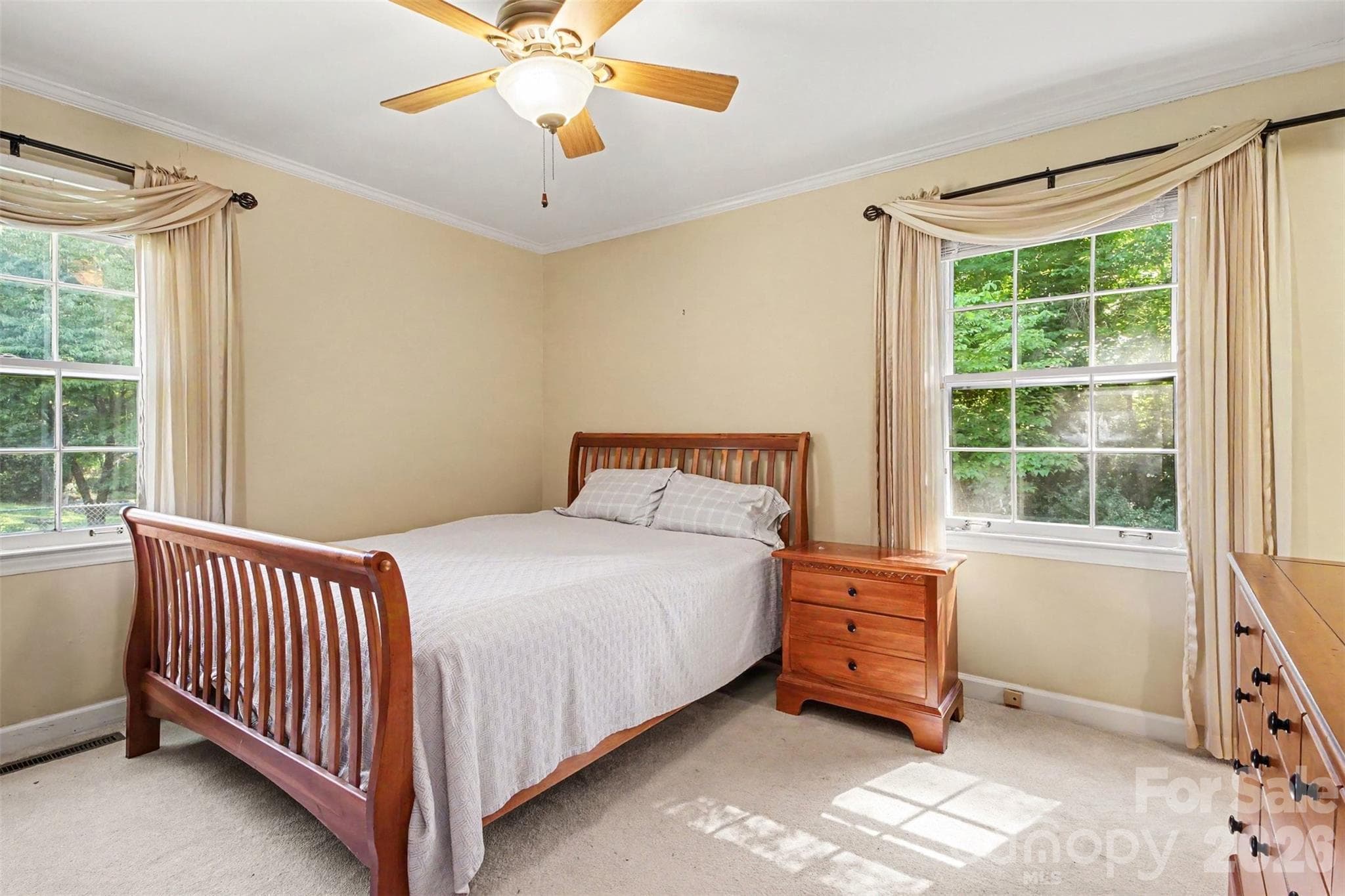 Primary Bedroom with En-Suite Full Bath. We do believe there maybe hardwoods under this carpet - 113 Brookshire Avenue, Kannapolis