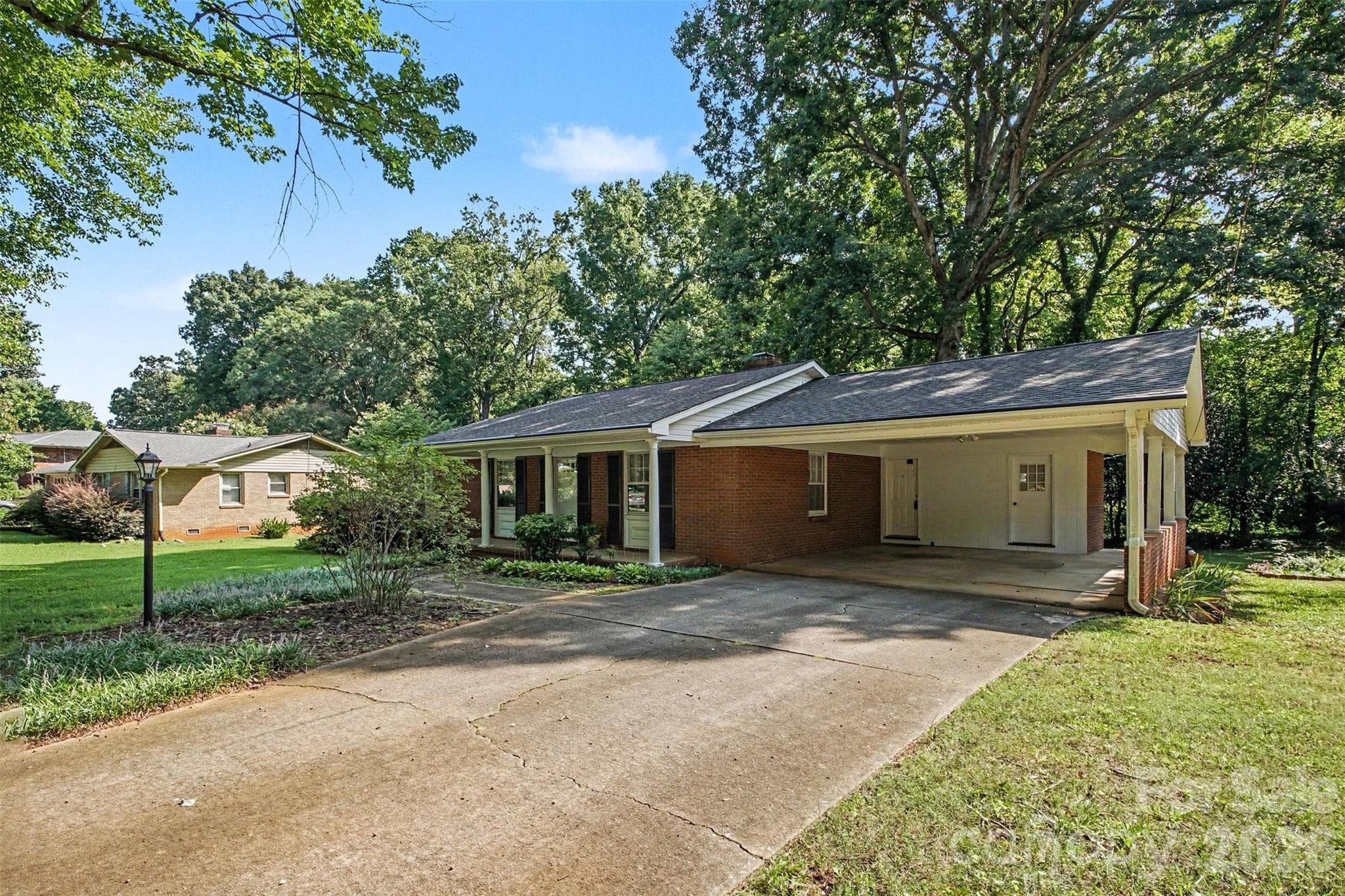 Offering Lots of Parking Spaces for Family and Friends. The Carport features an utility area for extra storage - 113 Brookshire Avenue, Kannapolis