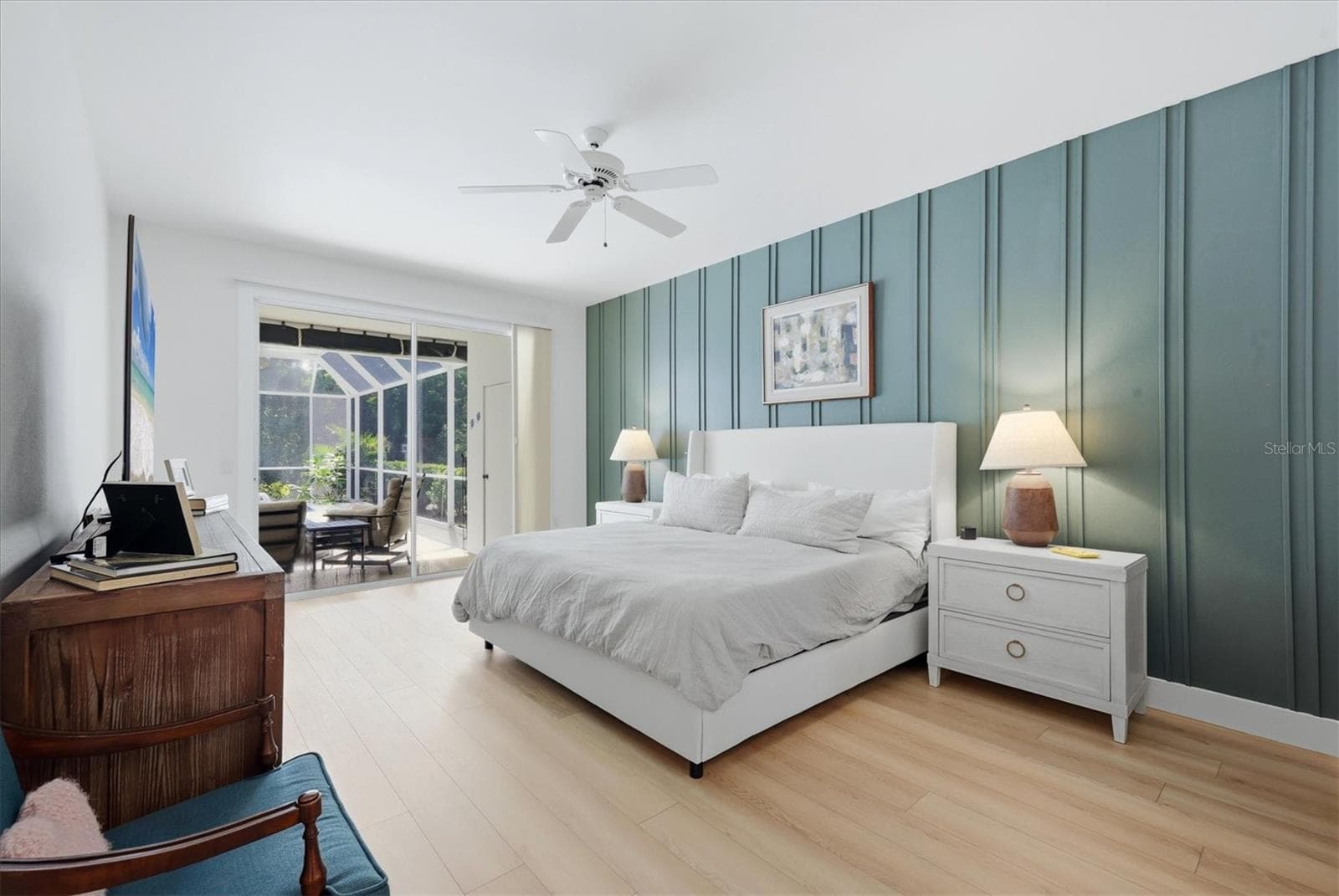 Primary bedroom with sliders to pool. - 8857 HAVENRIDGE DR, SARASOTA