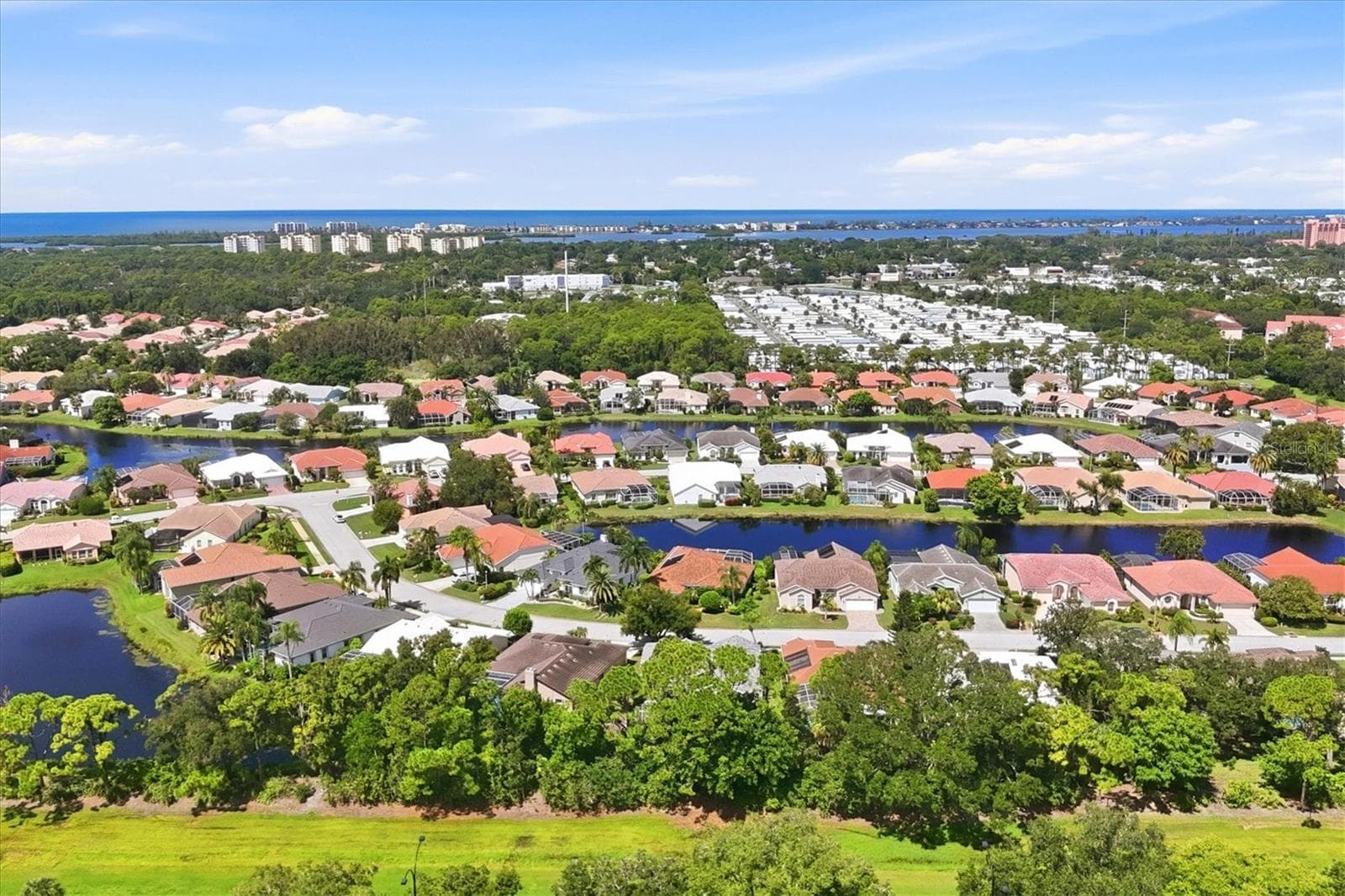 Aerial showing neighborhood - 8857 HAVENRIDGE DR, SARASOTA