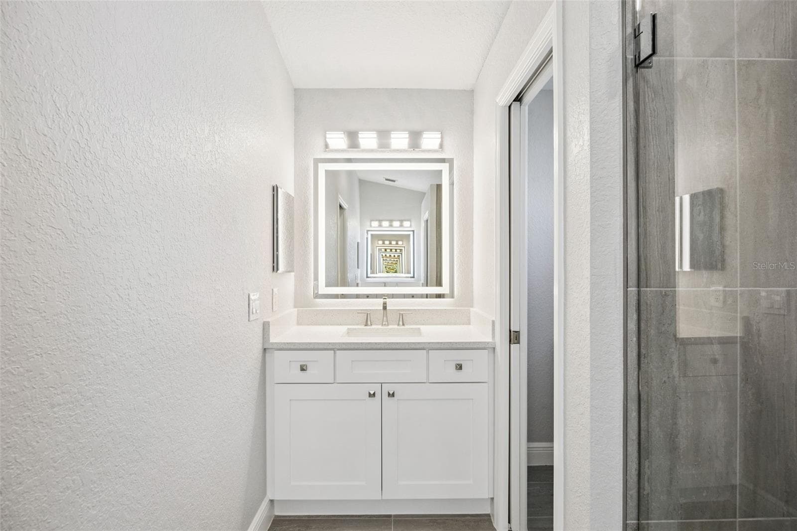 His & Her tall vanities with Quartz top, soft-close hinges (even on the medicaine cabinets), touch lighting/mirror (dimmable) - 5606 LAVER ST, LEESBURG