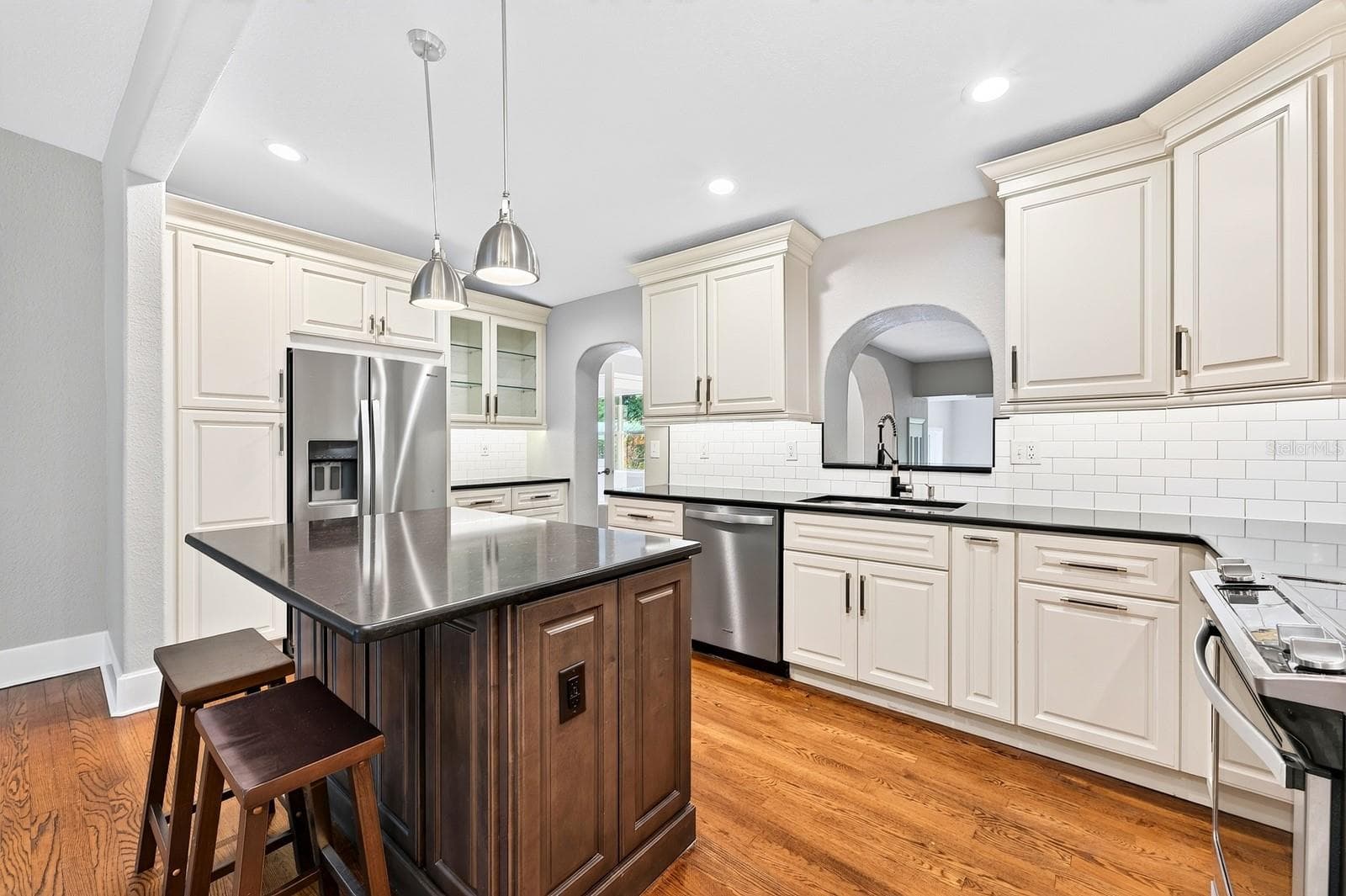 The remodeled kitchen offers updated finishes, ample storage and thoughtful details! - 1212 ELMWOOD ST, ORLANDO