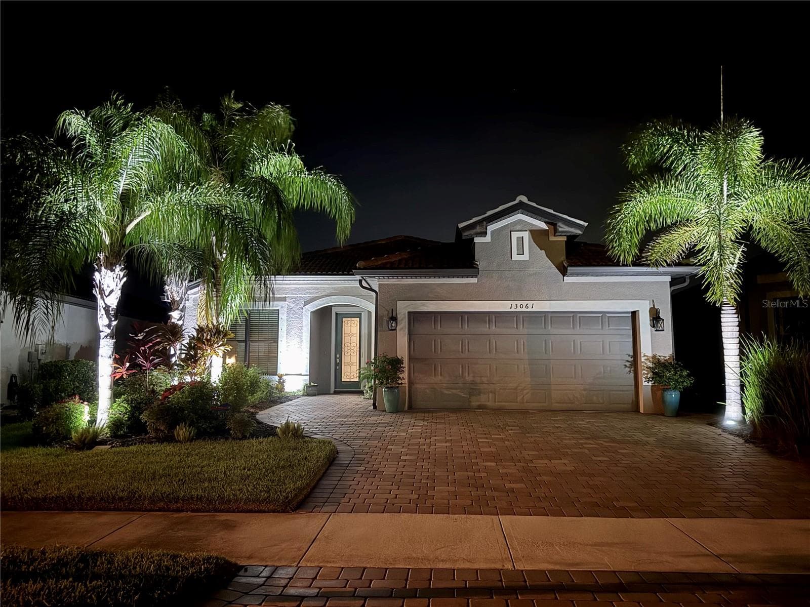 Automatic Uplighting in the front and back of property at night. - 13061 RINELLA ST, VENICE