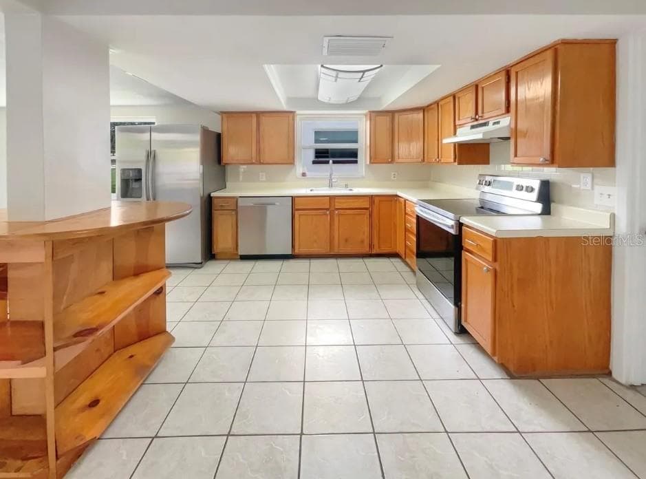 Single Family Residence at 2530 FLINTWOOD DR, HOLIDAY, photo 5 of 13