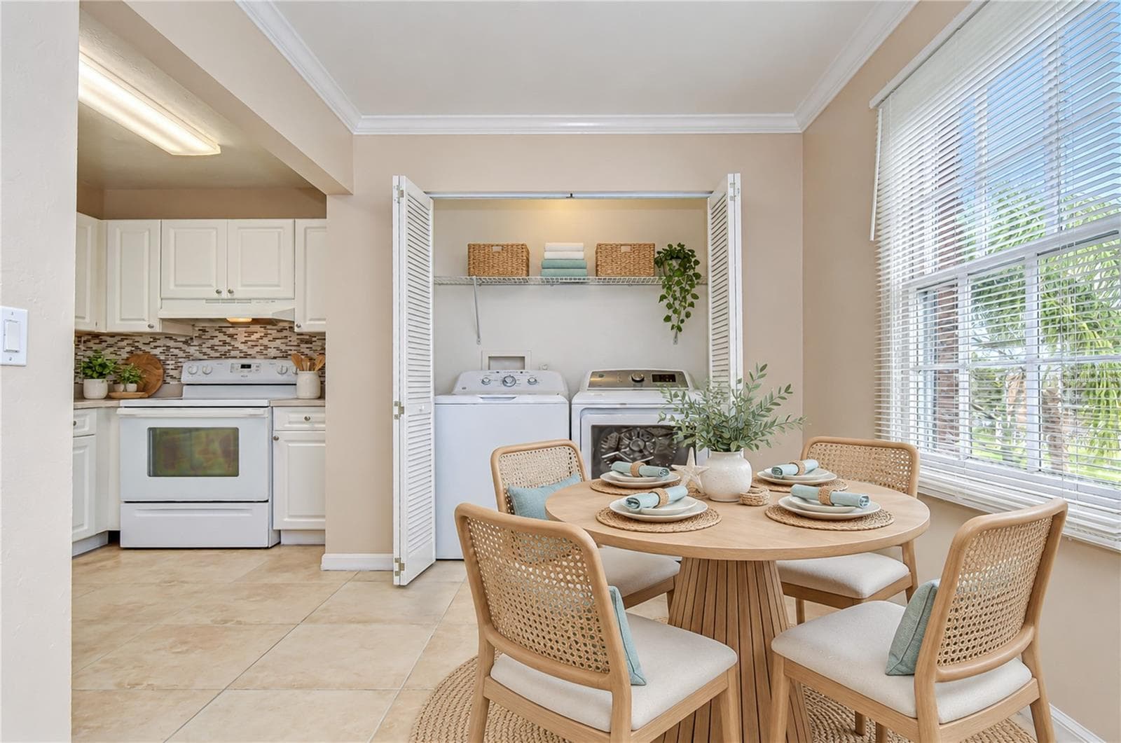 Dining Area opens to Kitchen & Family Room (virtually staged) - 13693 ORANGE SUNSET DR #203, TAMPA
