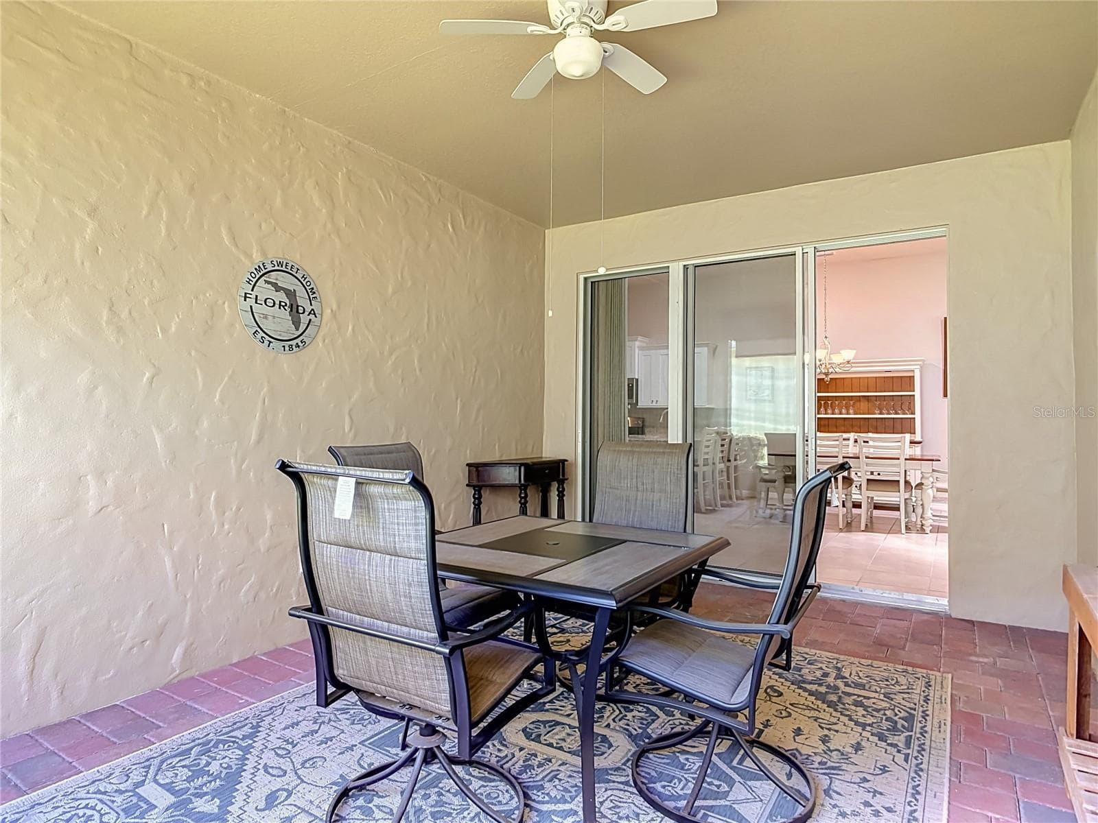 screened lanai with walls on three sides - 3338 TORRE BLVD, NEW SMYRNA BEACH