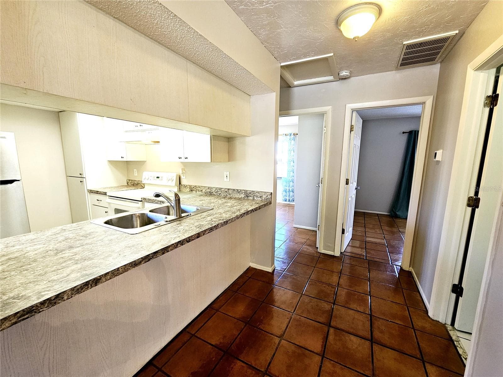 Hallway - 9000 GRIGGS RD #A, ENGLEWOOD