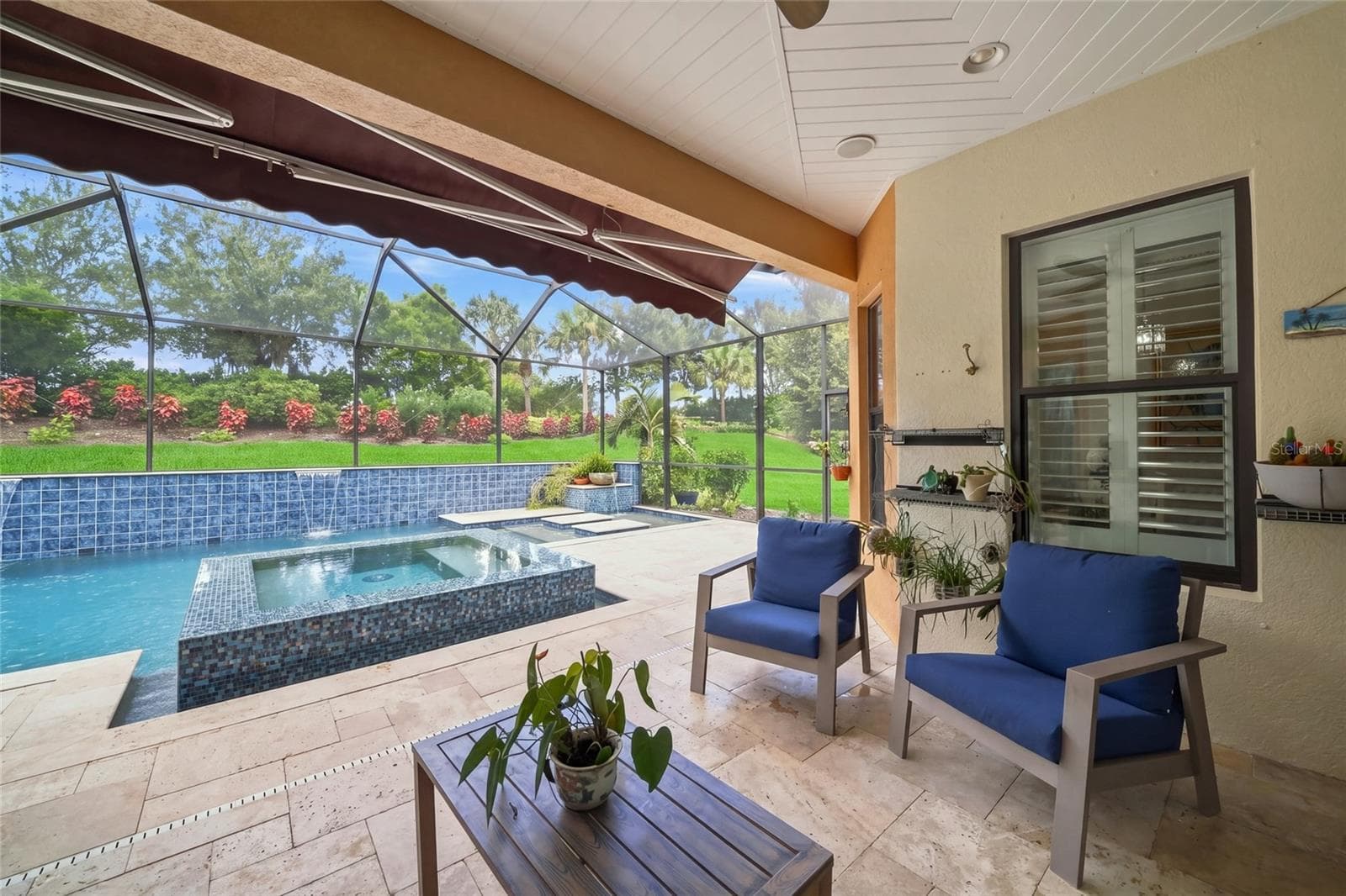 Outdoor covered space with awning - 12672 FONTANA LOOP, BRADENTON