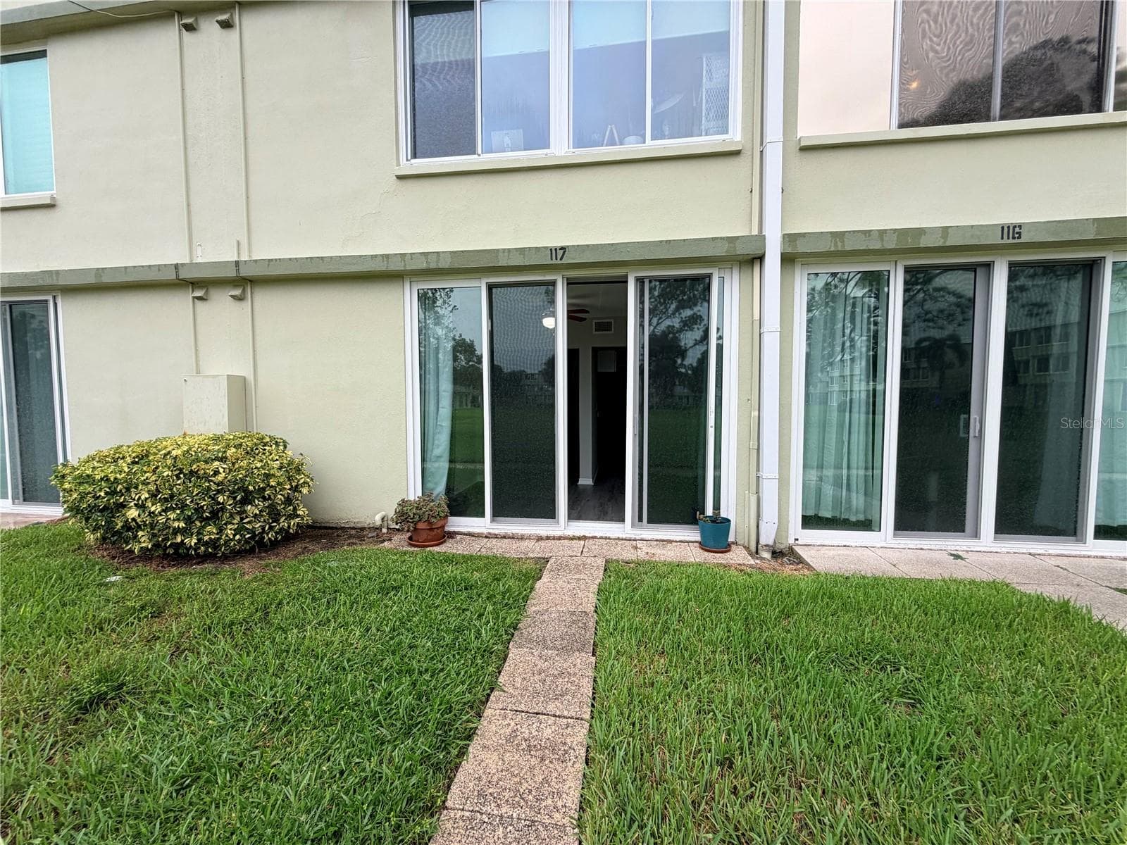 Back of unit from outside - 4885 1ST ST NE #117, ST PETERSBURG