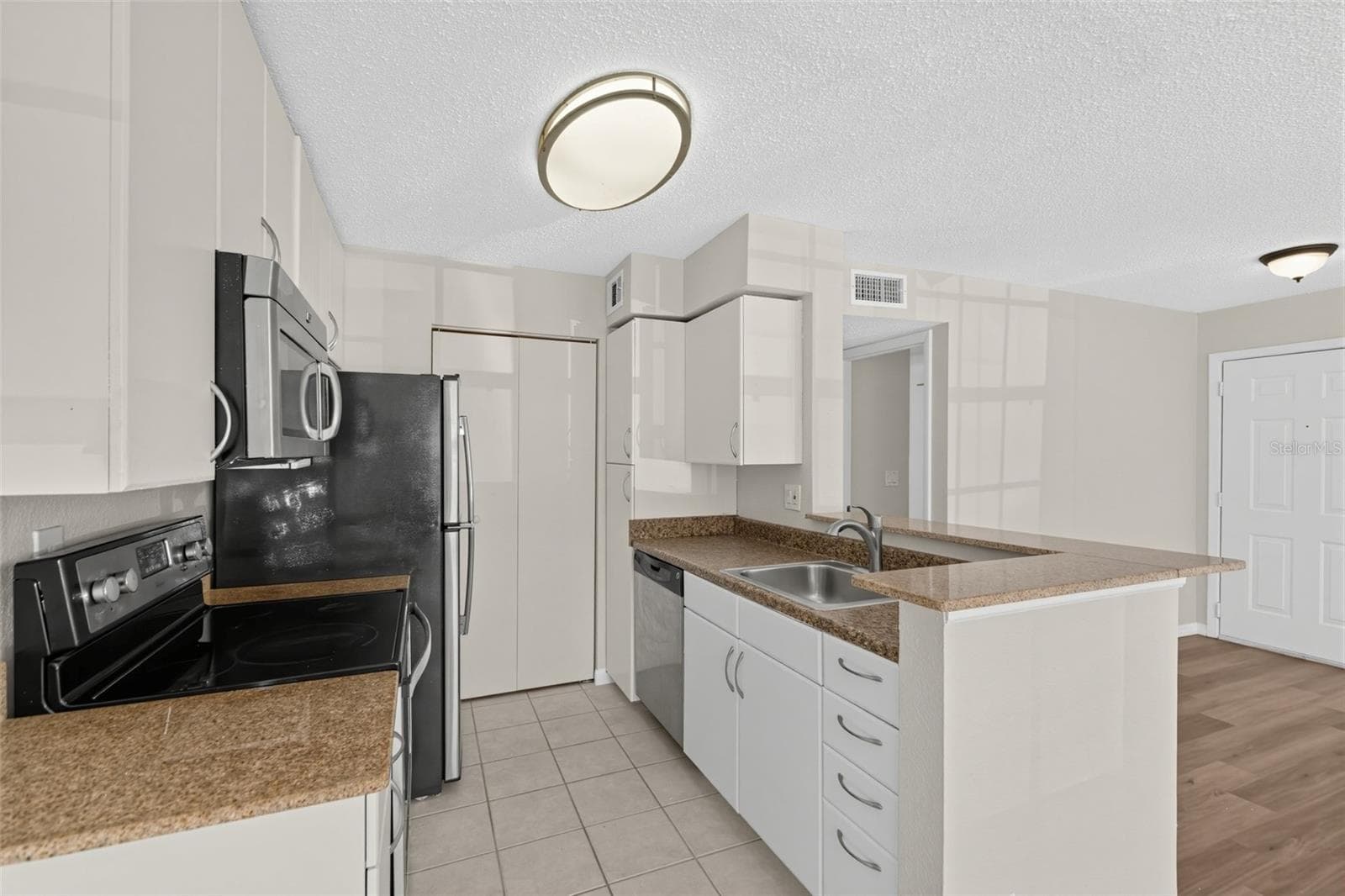 Condominium at 11550 WESTWOOD BLVD #1211, ORLANDO, photo 7 of 37