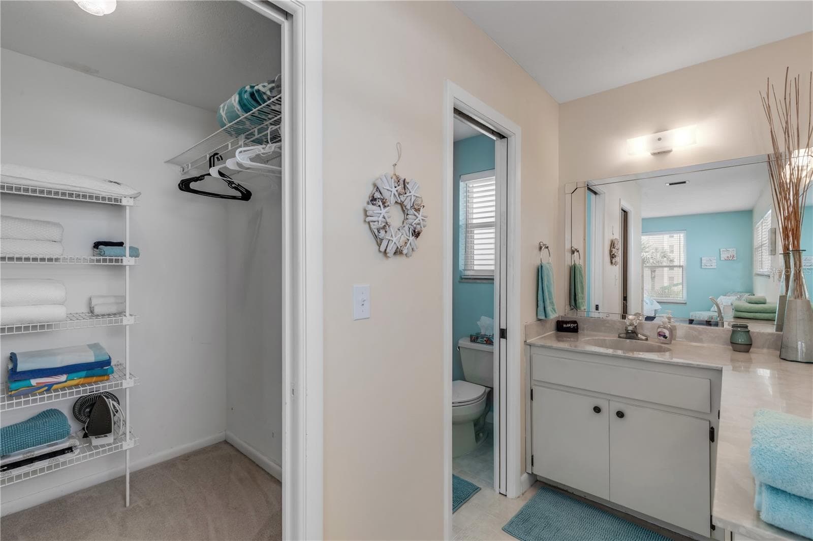 Apartment 2 Primary Bedroom's en-suite Bath with walk in closet - 2707 S ATLANTIC AVE, NEW SMYRNA BEACH