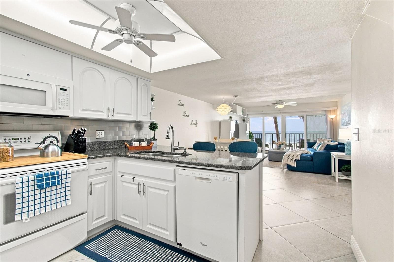 Kitchen and Open floor plan - 60 GULF BLVD #214, INDIAN ROCKS BEACH