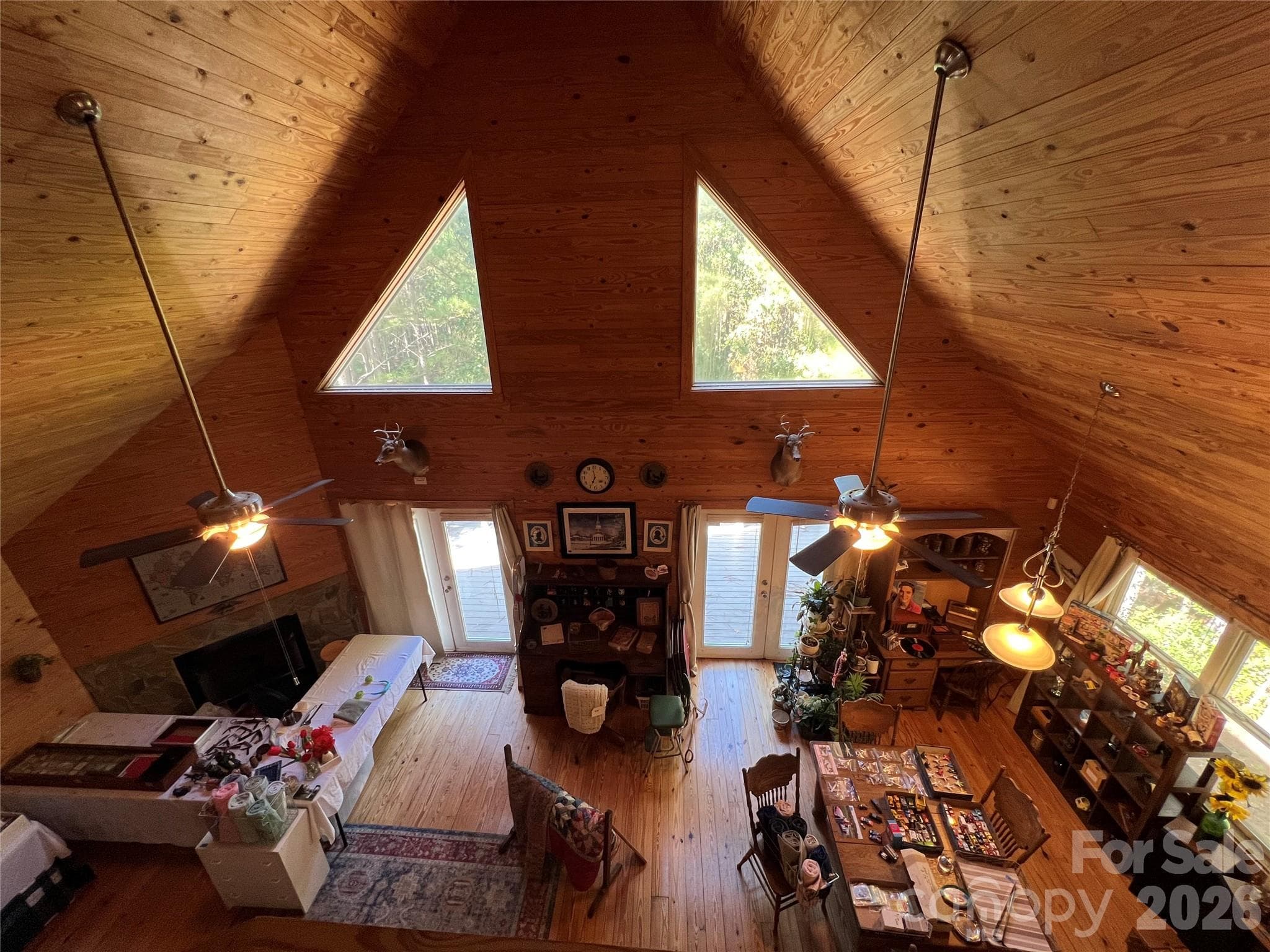 Large living room and dining open concept with fireplace - 651 Dills Road, Rutherfordton