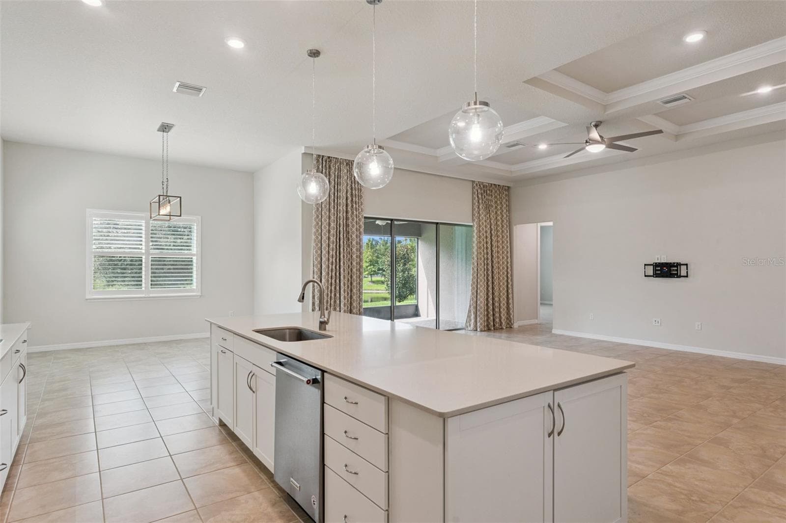 Kitchen View to the Dining Room - 1005 MARE WAY, OVIEDO