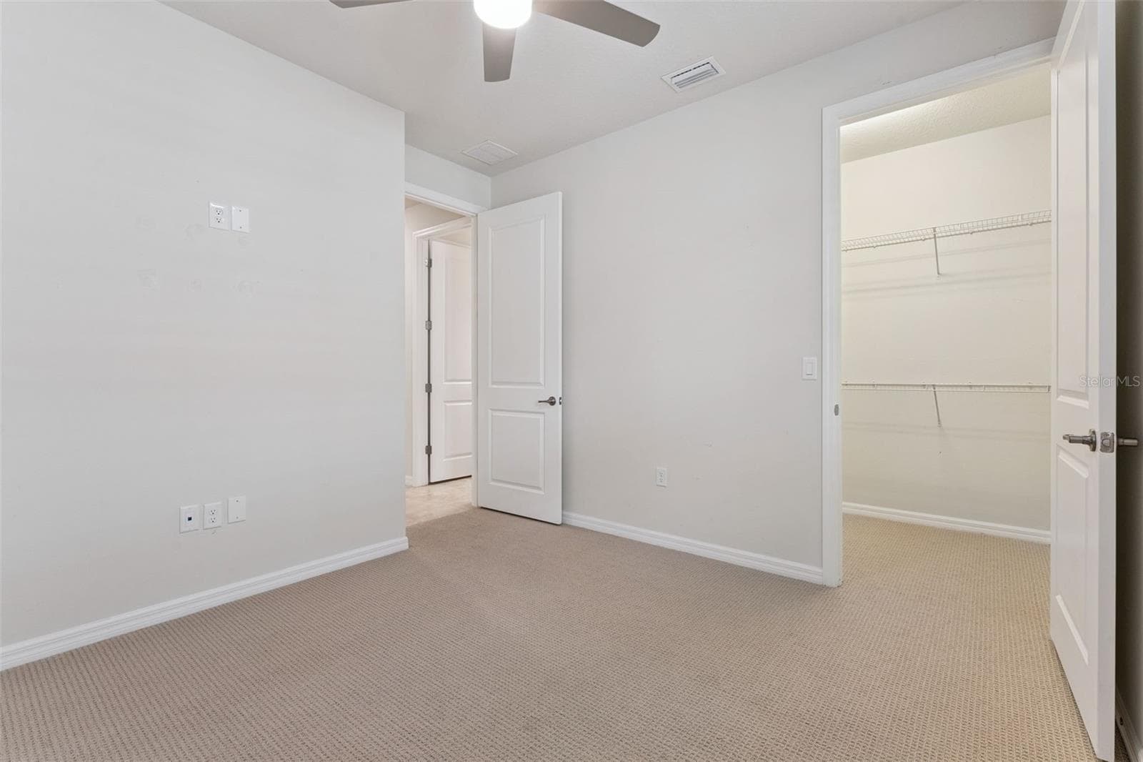 Bedroom 3 with a walk-in closet - 1005 MARE WAY, OVIEDO