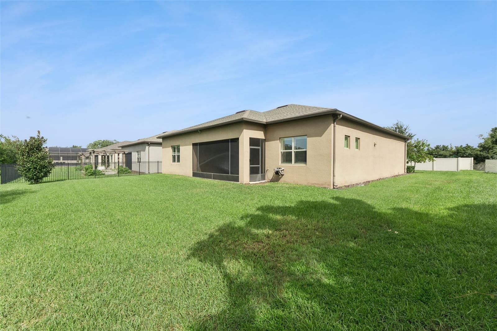 Rear Exterior and Backyard - 1005 MARE WAY, OVIEDO